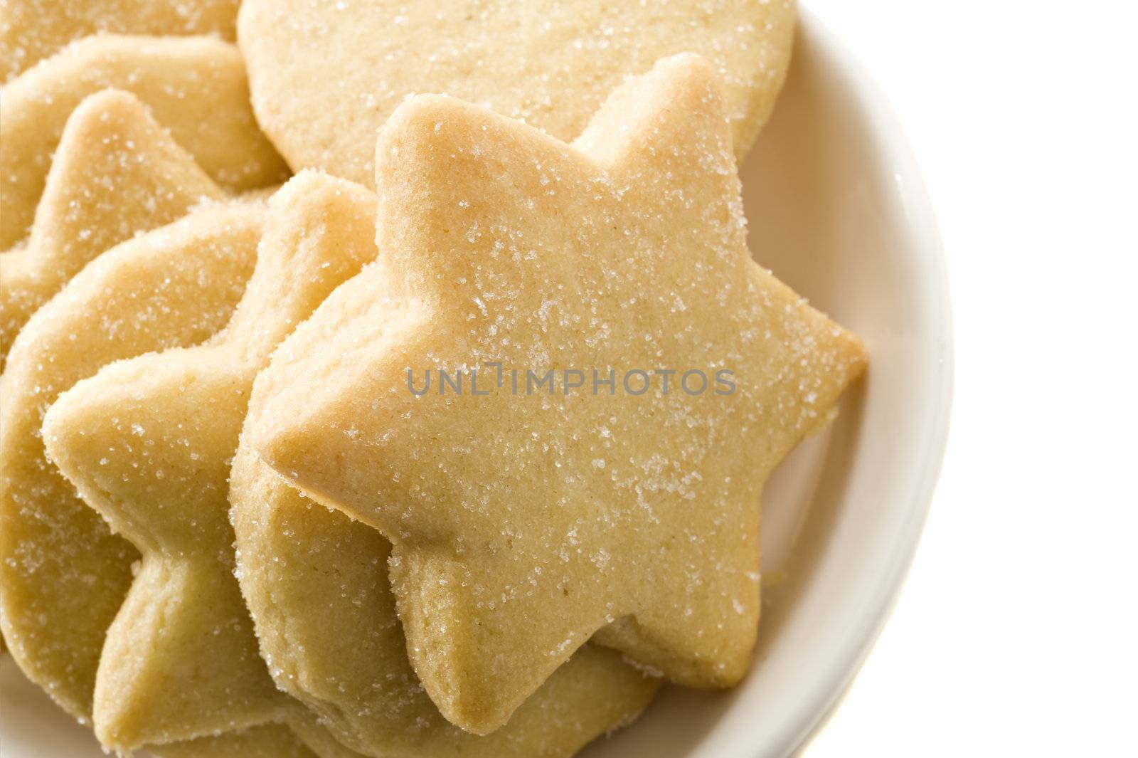 Star shaped homemade cookies in a white plate by tish1