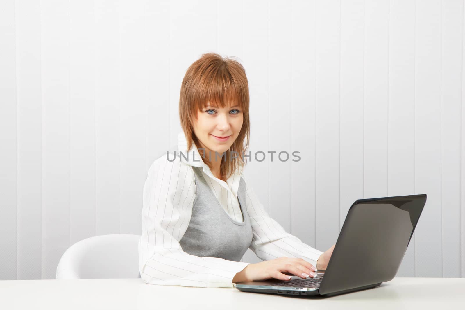attractive girl with a computer. Business woman