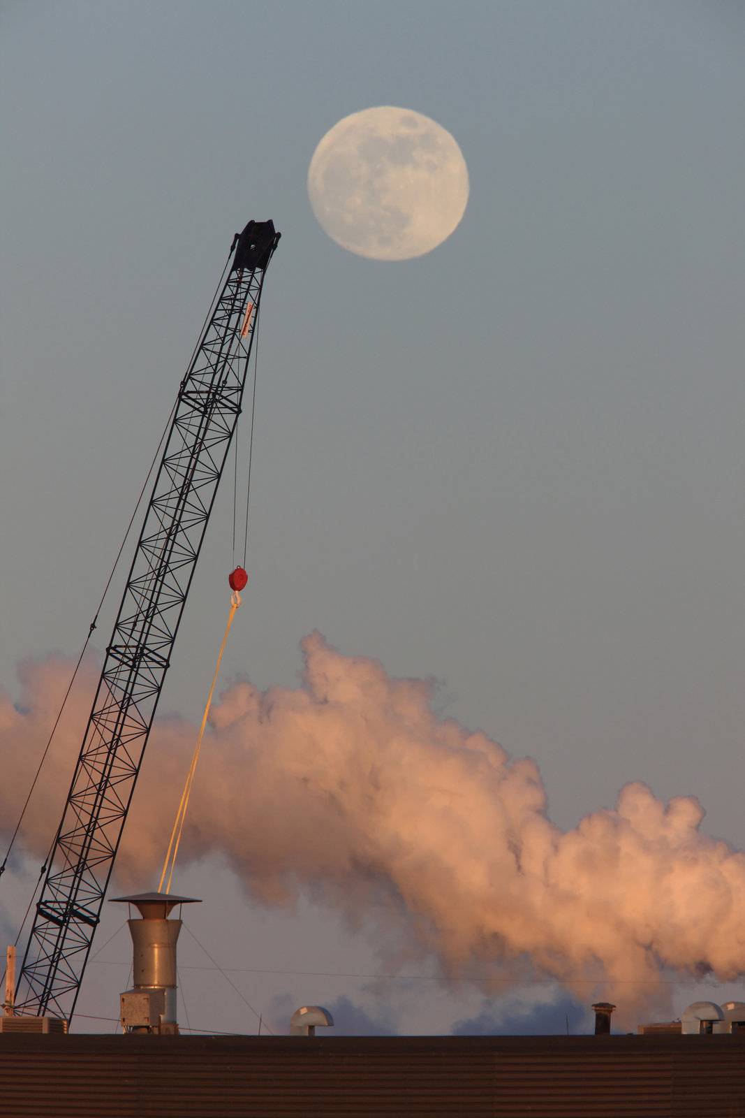 Full Moon and Crane Canada by pictureguy
