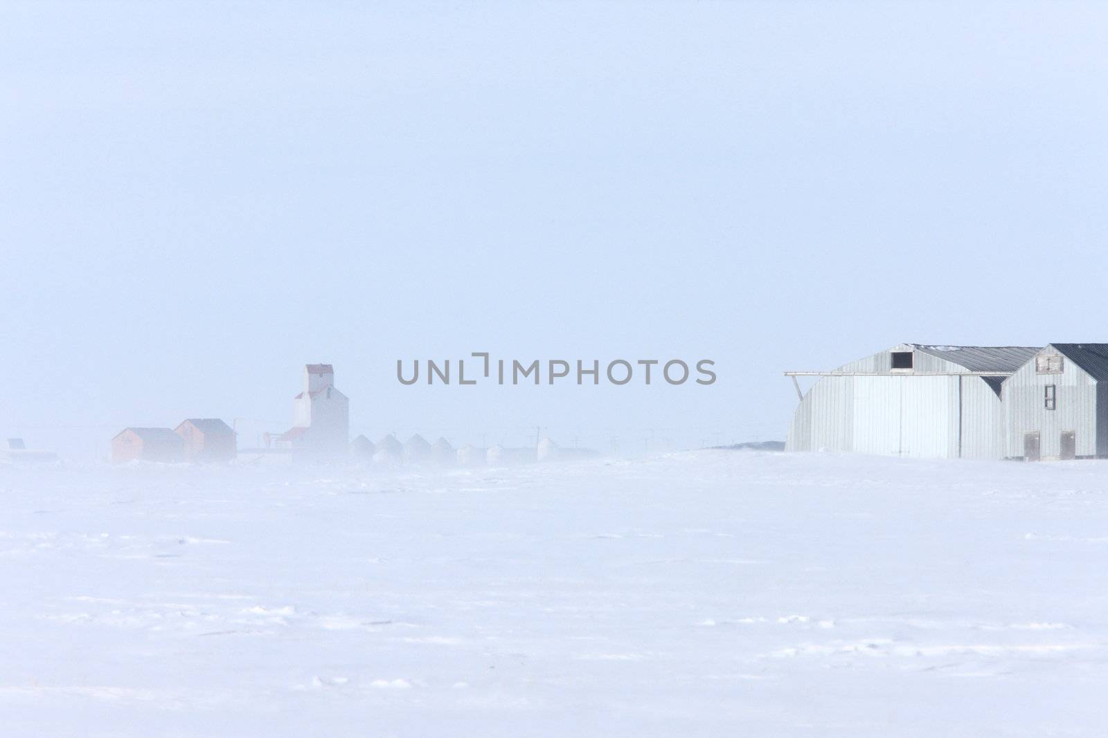 Town and Grain Elevator in Blizzard Saskatchewan 