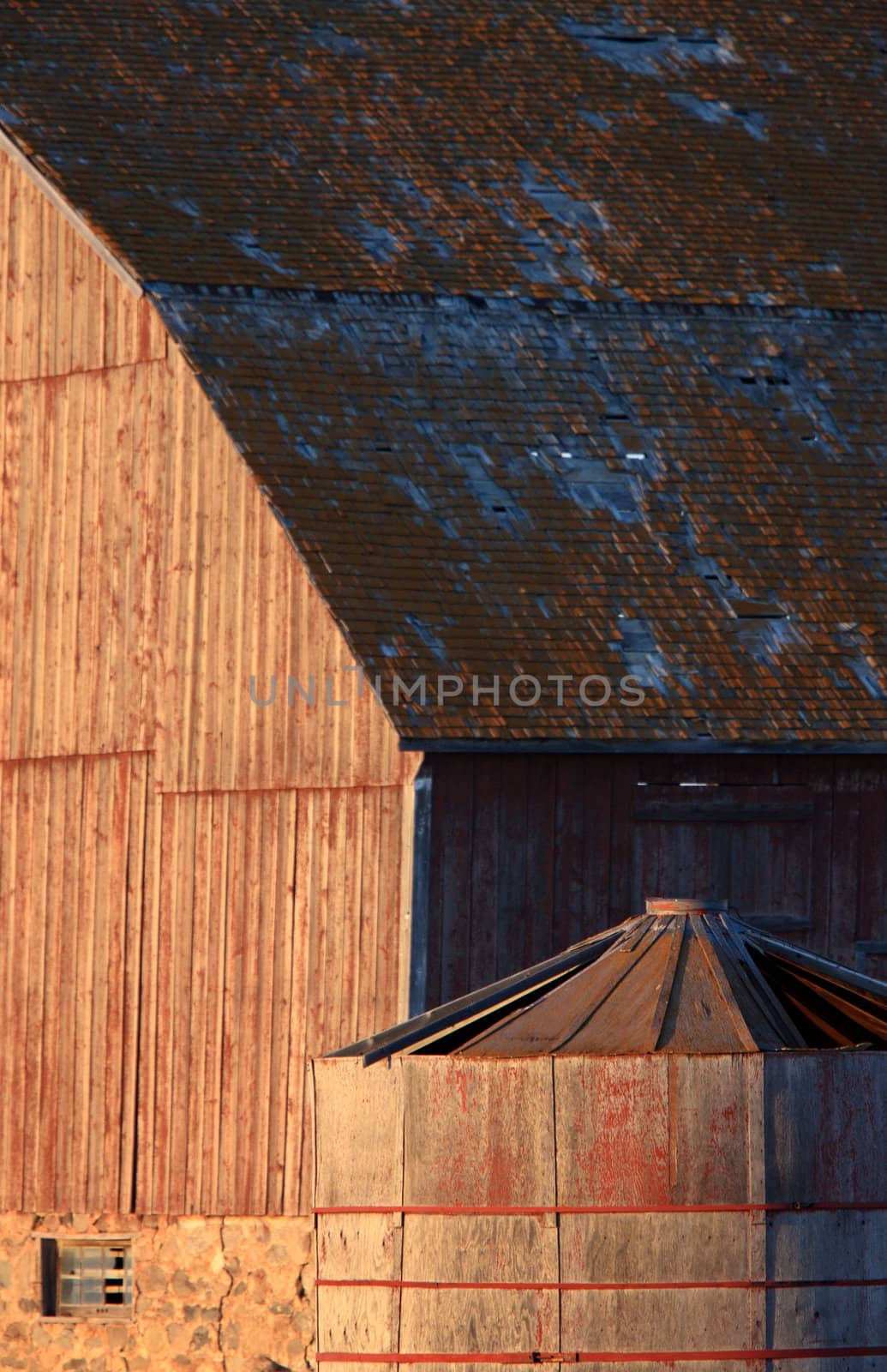 Old Barn and Wooden Granary Saskatchewan by pictureguy
