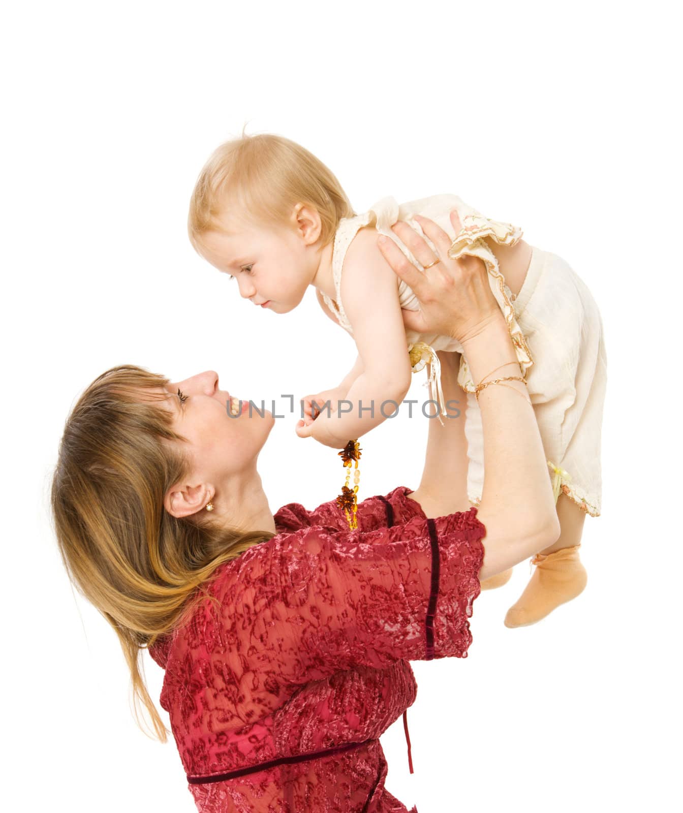 Mother and daughter posing together isolated on white