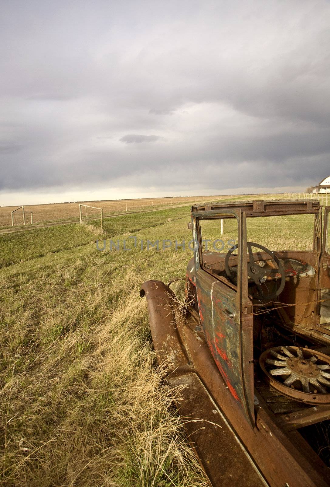 Antique Vintage Old Car in Field by pictureguy