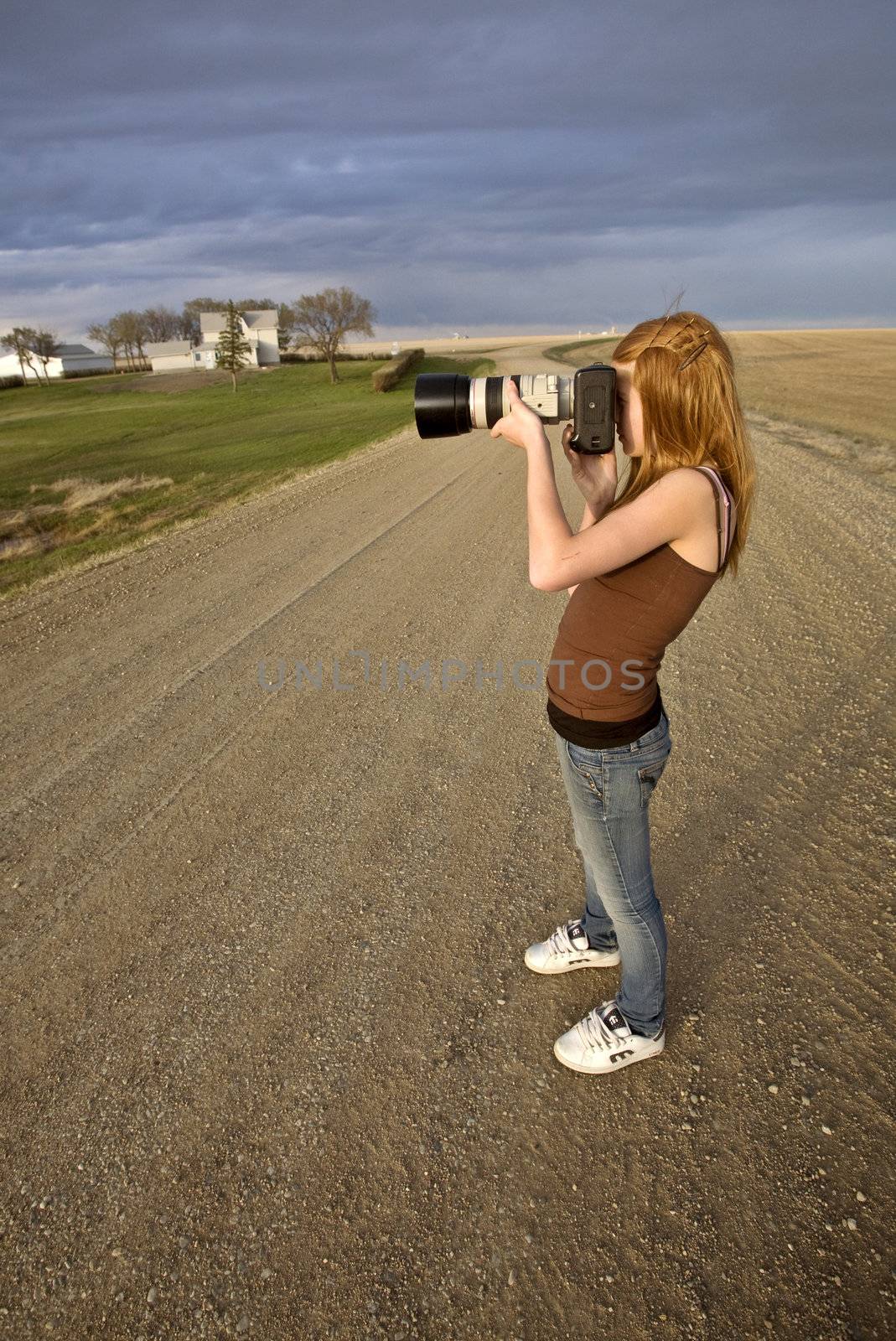 Young Girl Lanscape Photographer by pictureguy