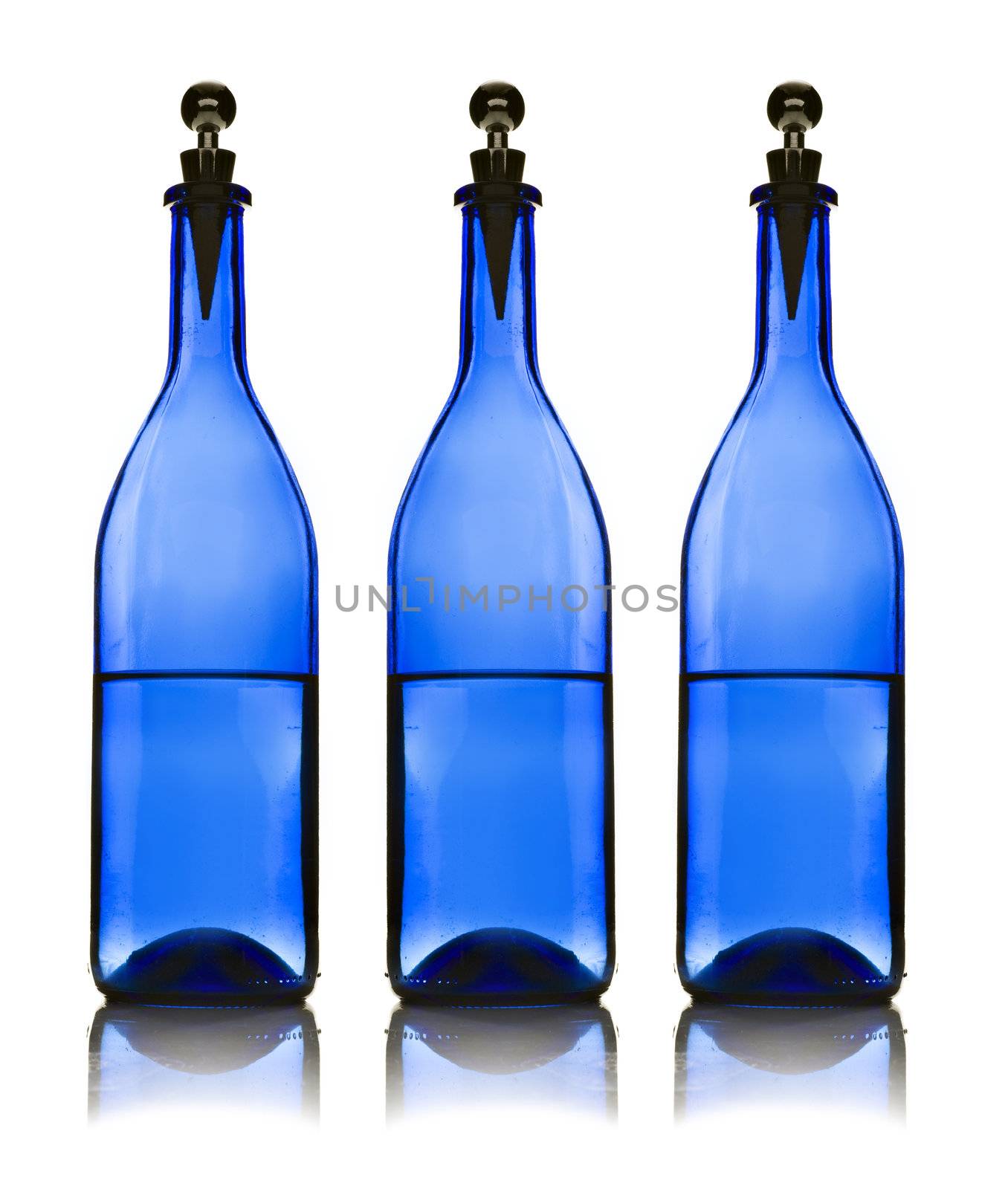 Three blue water bottles on  white background by tish1