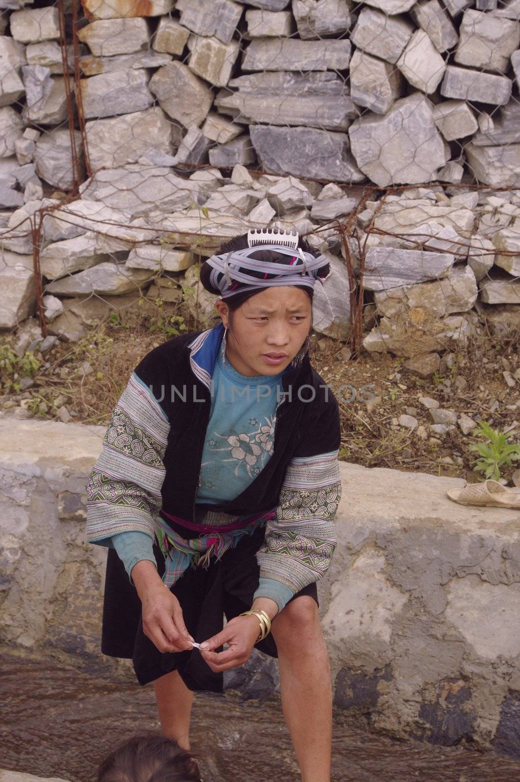 Portrait of a young blue Hmong woman by Duroc