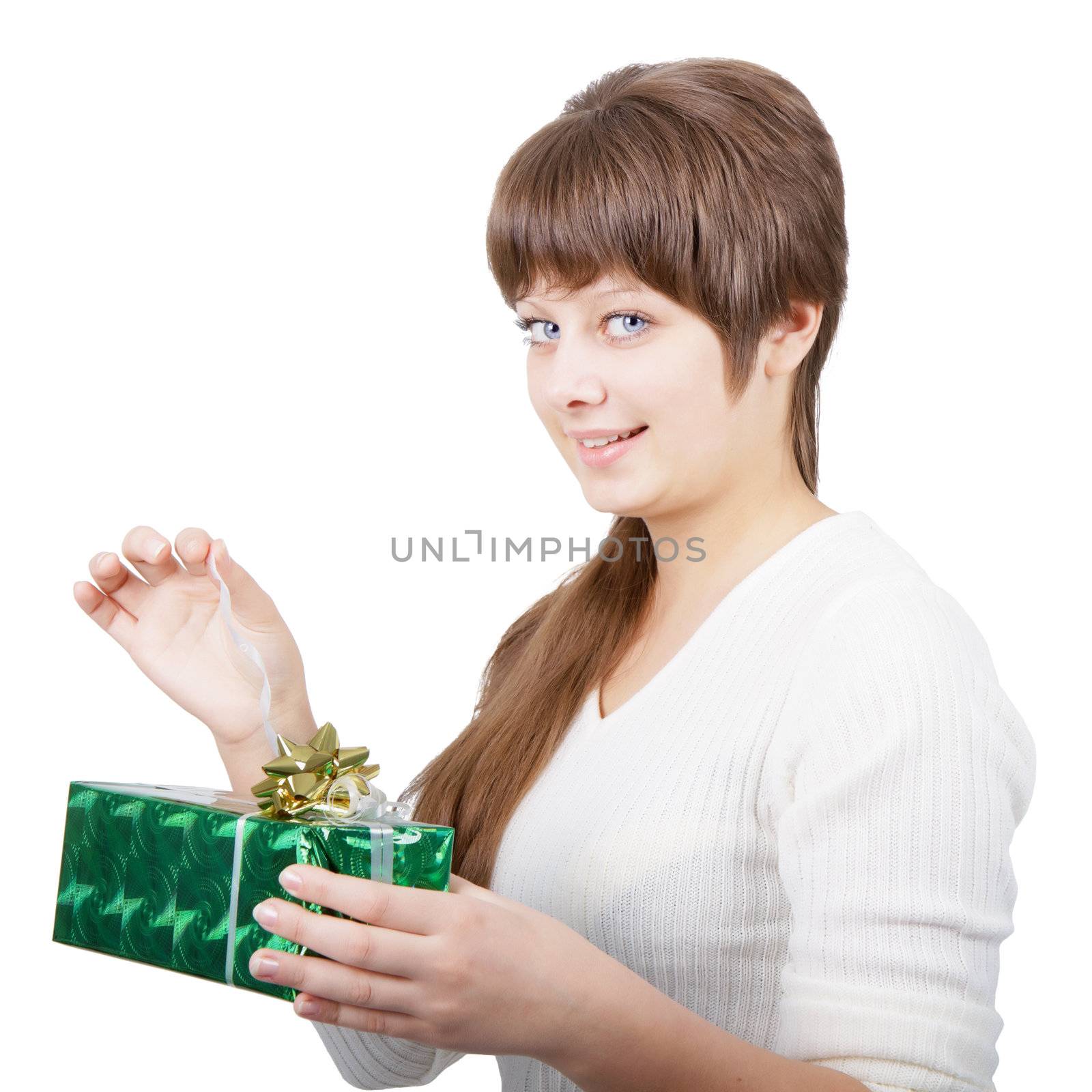 portrait of an attractive young woman with a gift on a white background
