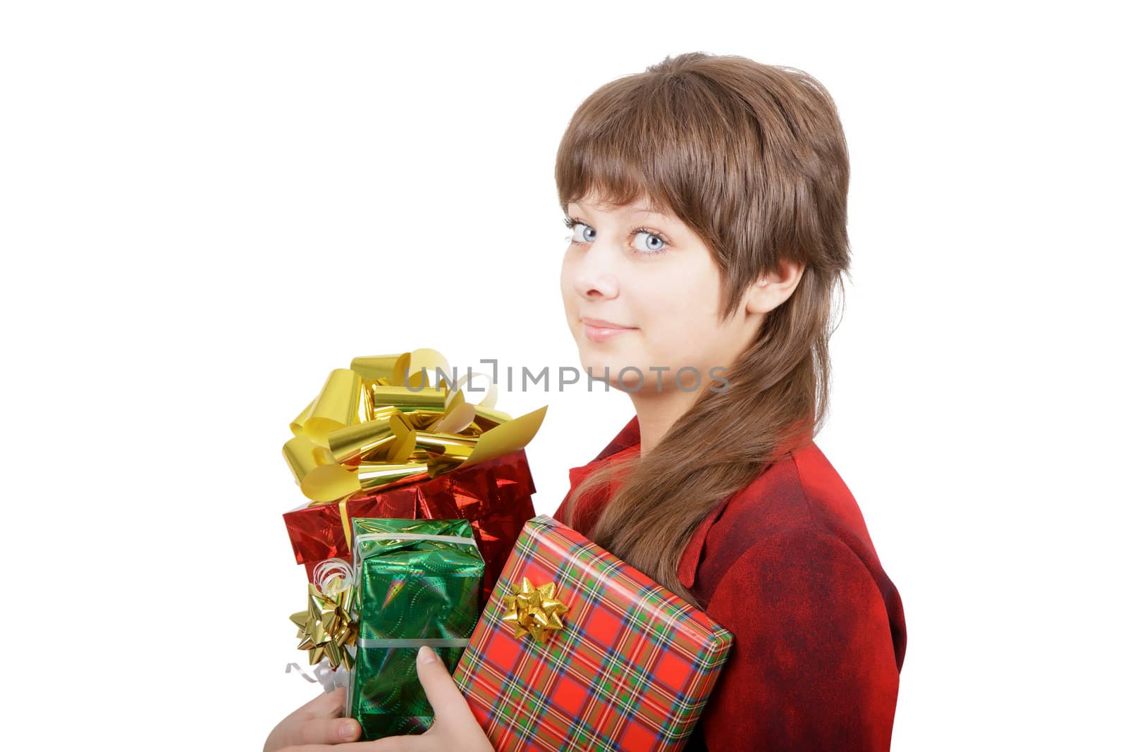 portrait of an attractive young woman with gift boxes on white background
