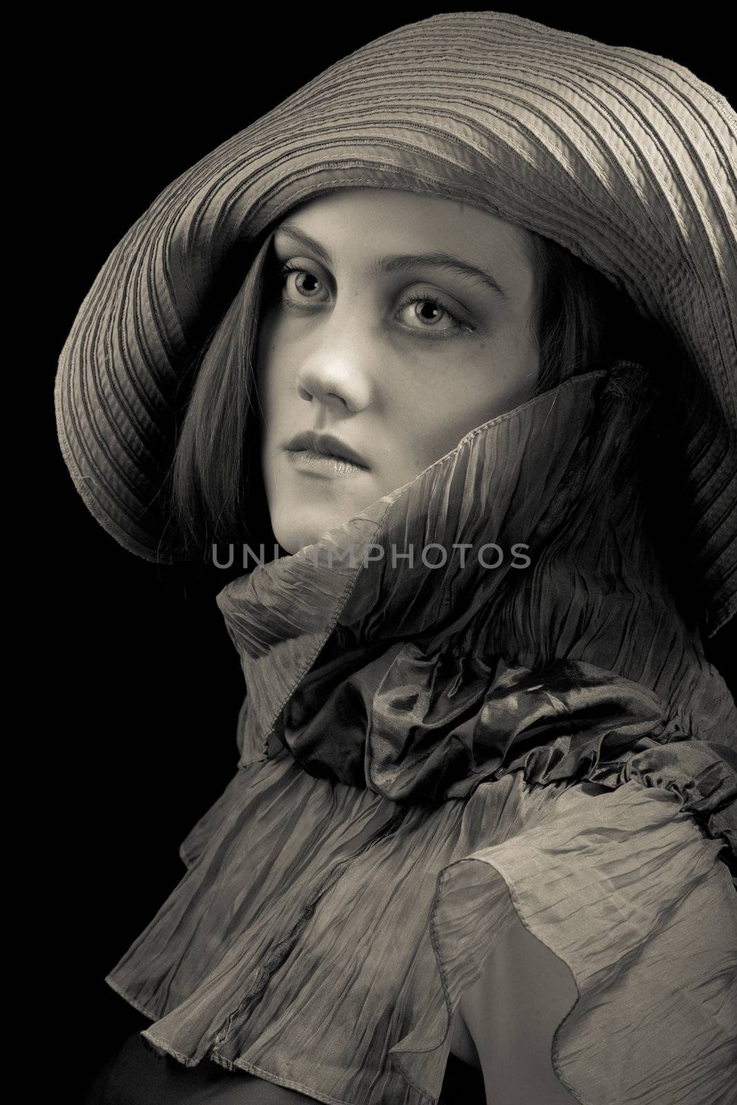 Portrait of a beauty in hat in style of 1910 - 1920