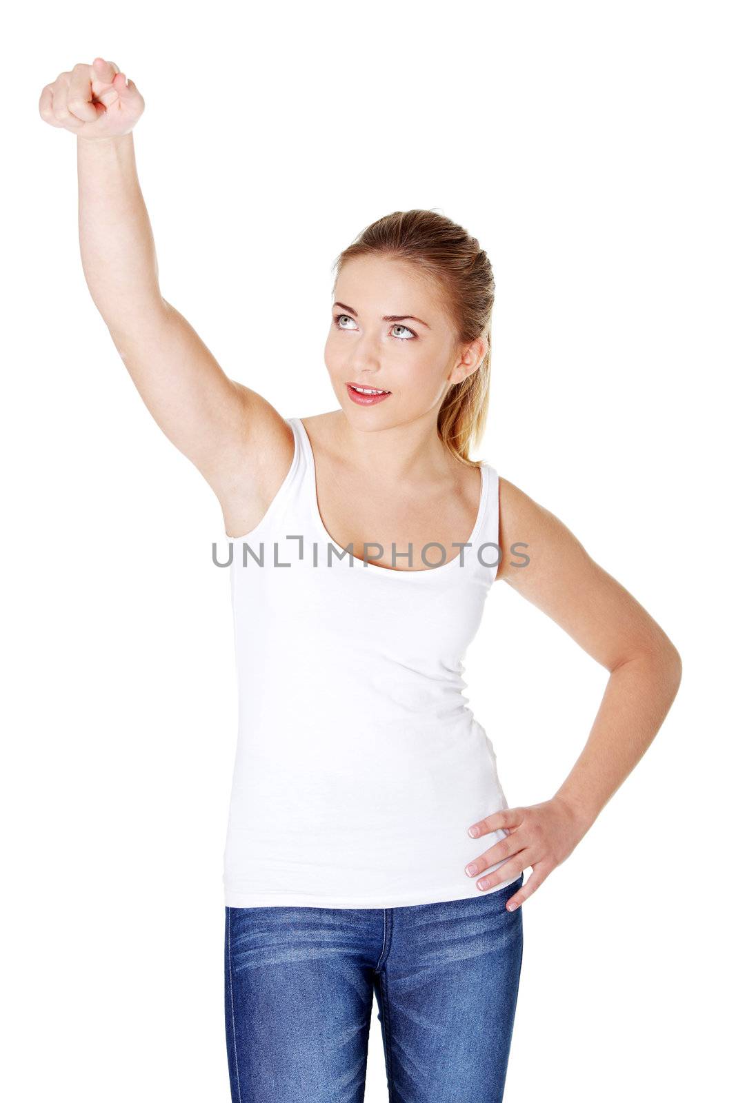 Pretty blonde caucasian girl standing and pushing abstract button. Isoalted on white.