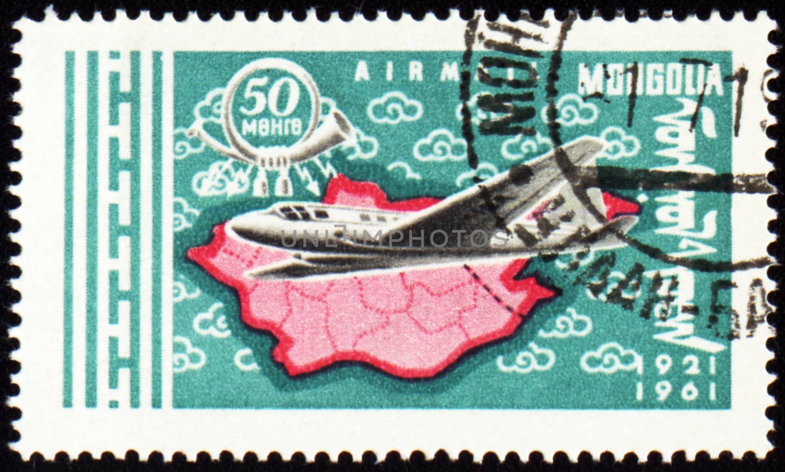 Flying air liner and map of Mongolia on post stamp by wander