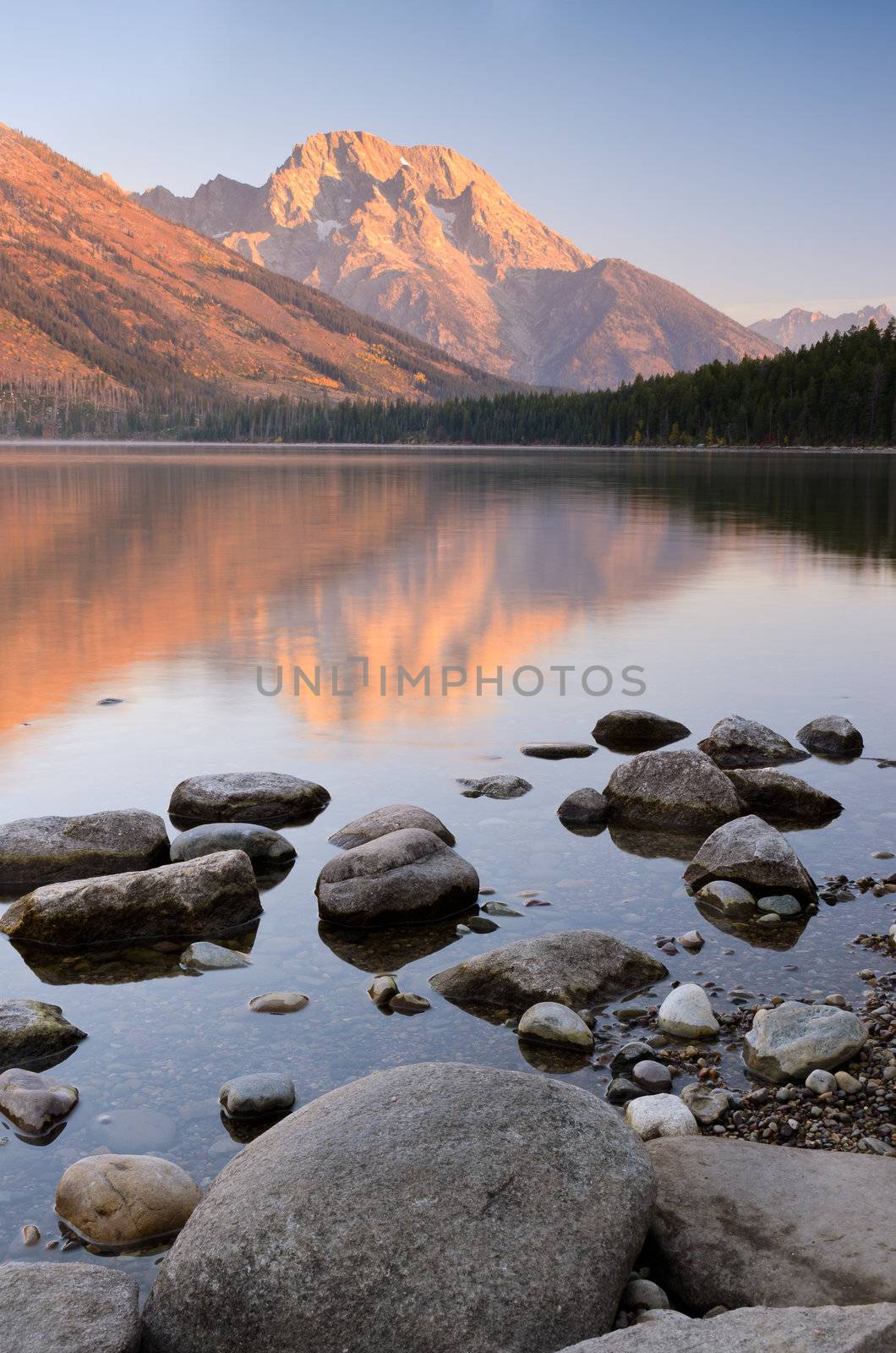 Boulders along the shore of Jenny Lake and Mount Moran, Grand Teton National Park, Wyoming, USA by CharlesBolin