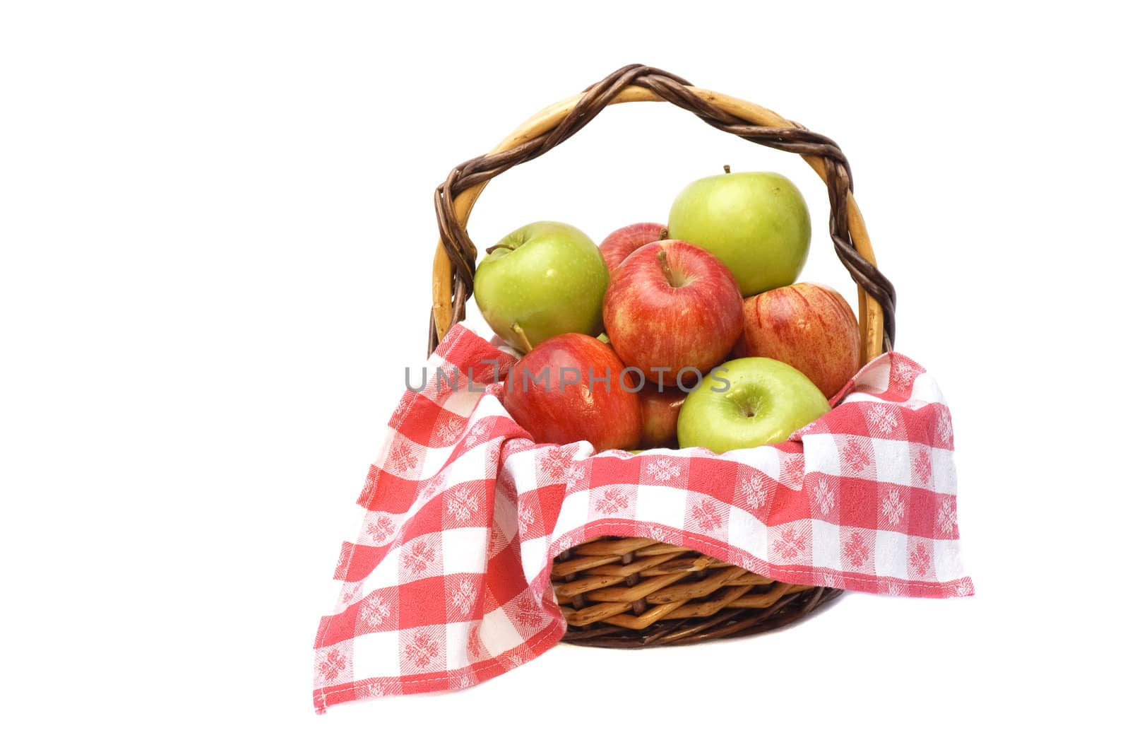 apples in a basket isolated on a white background