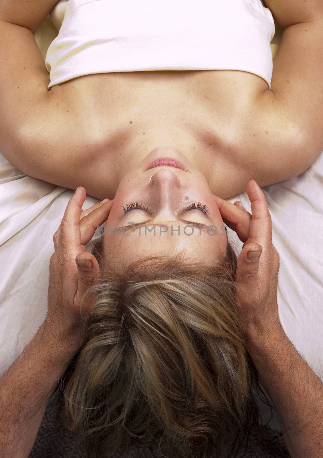 young woman getting Massage Therepy from a massuer