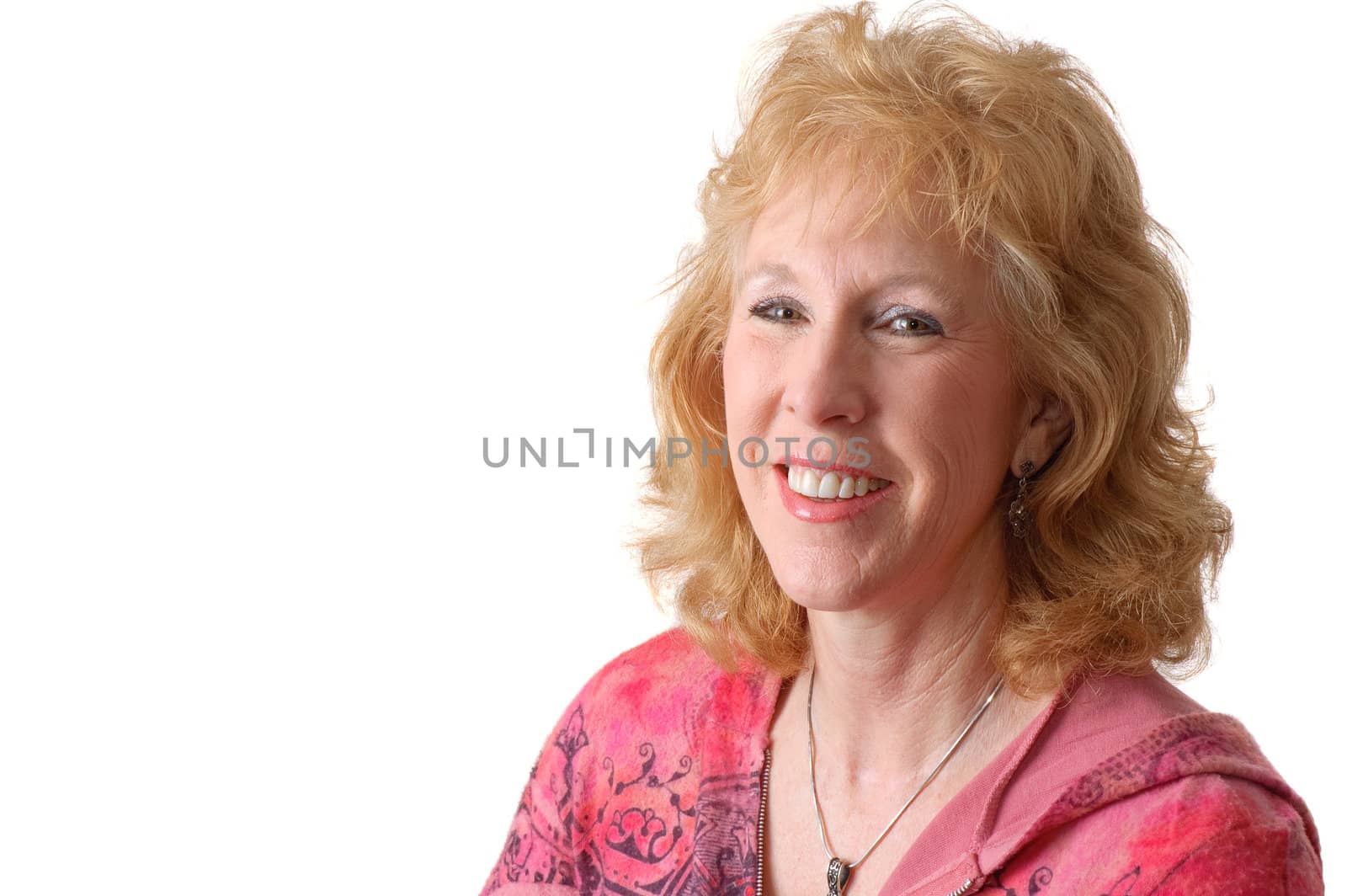 Happy, smiling older woman isolated on white