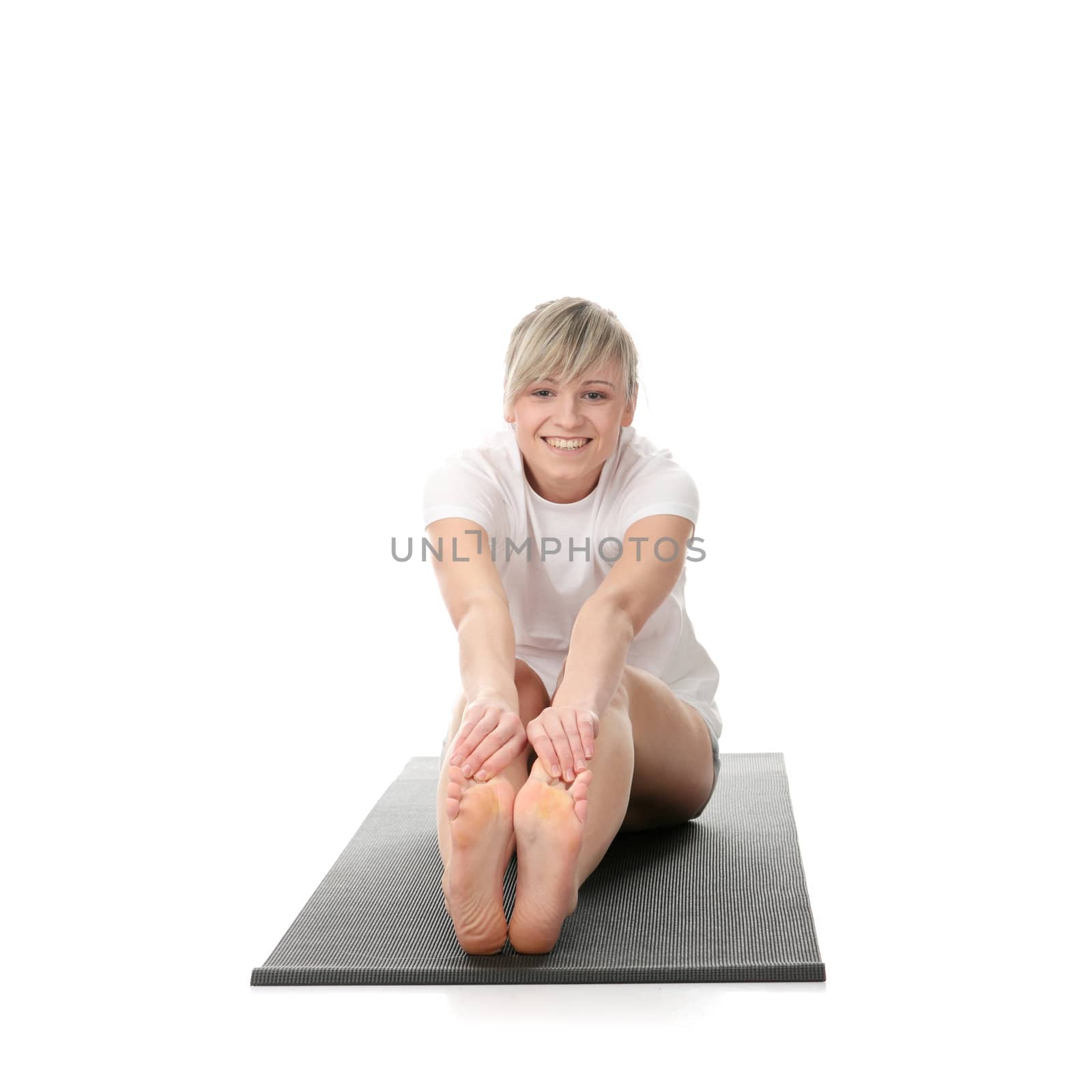 Young beautiful woman during fitness time and exercising, isolated on white background