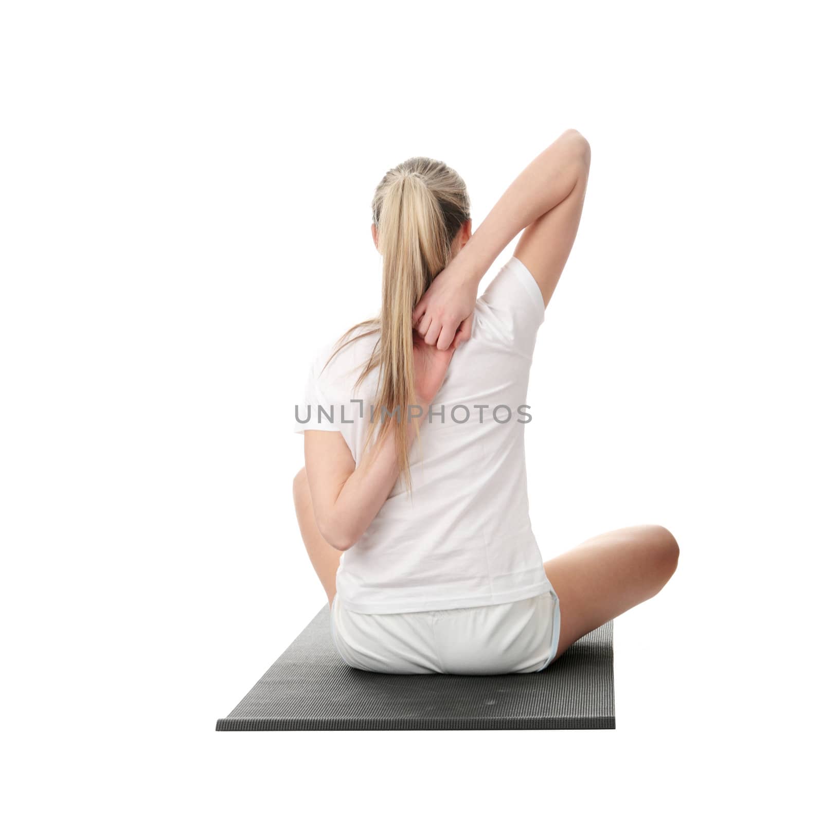 Young woman exercising isolated on white background