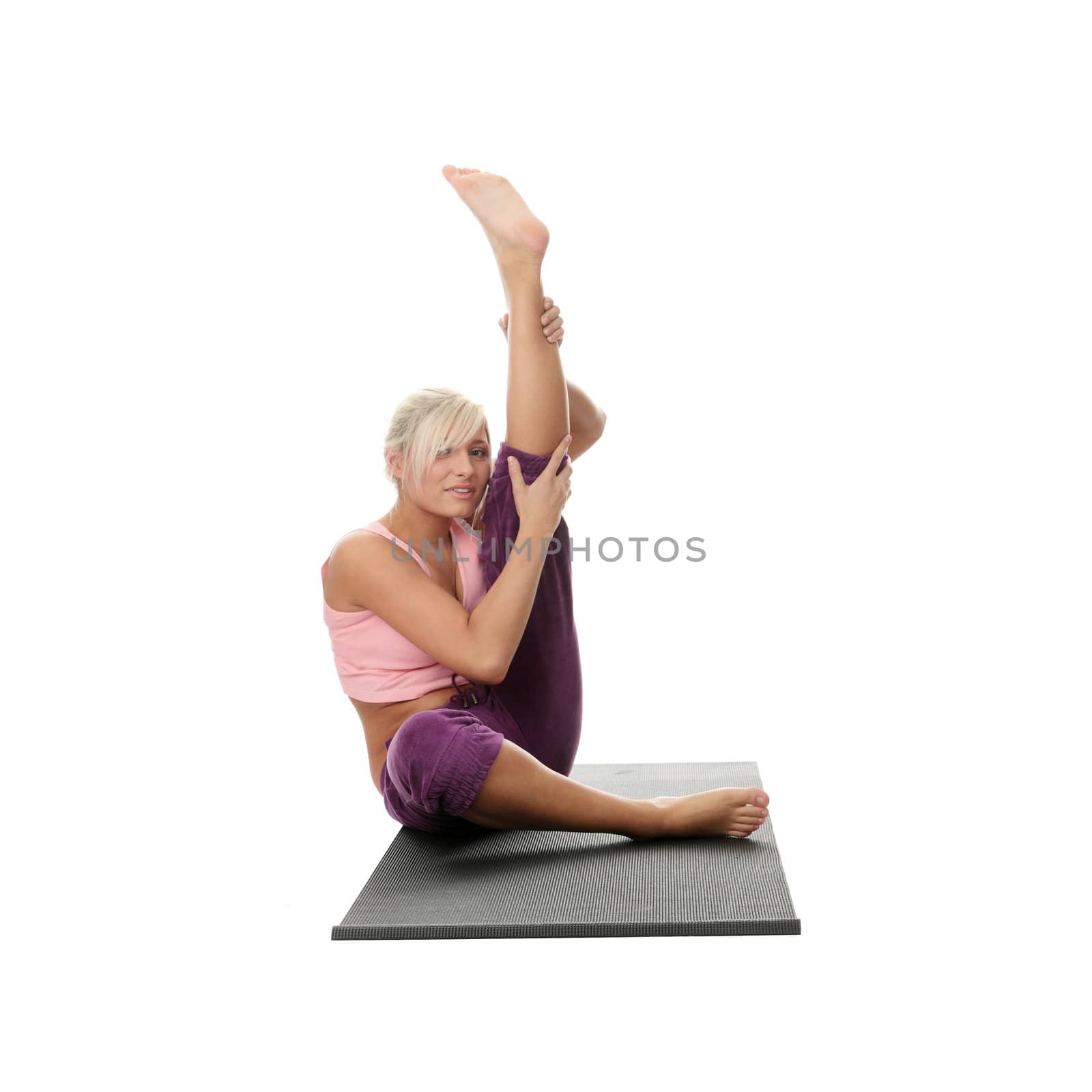 Young woman exercising isolated on white background