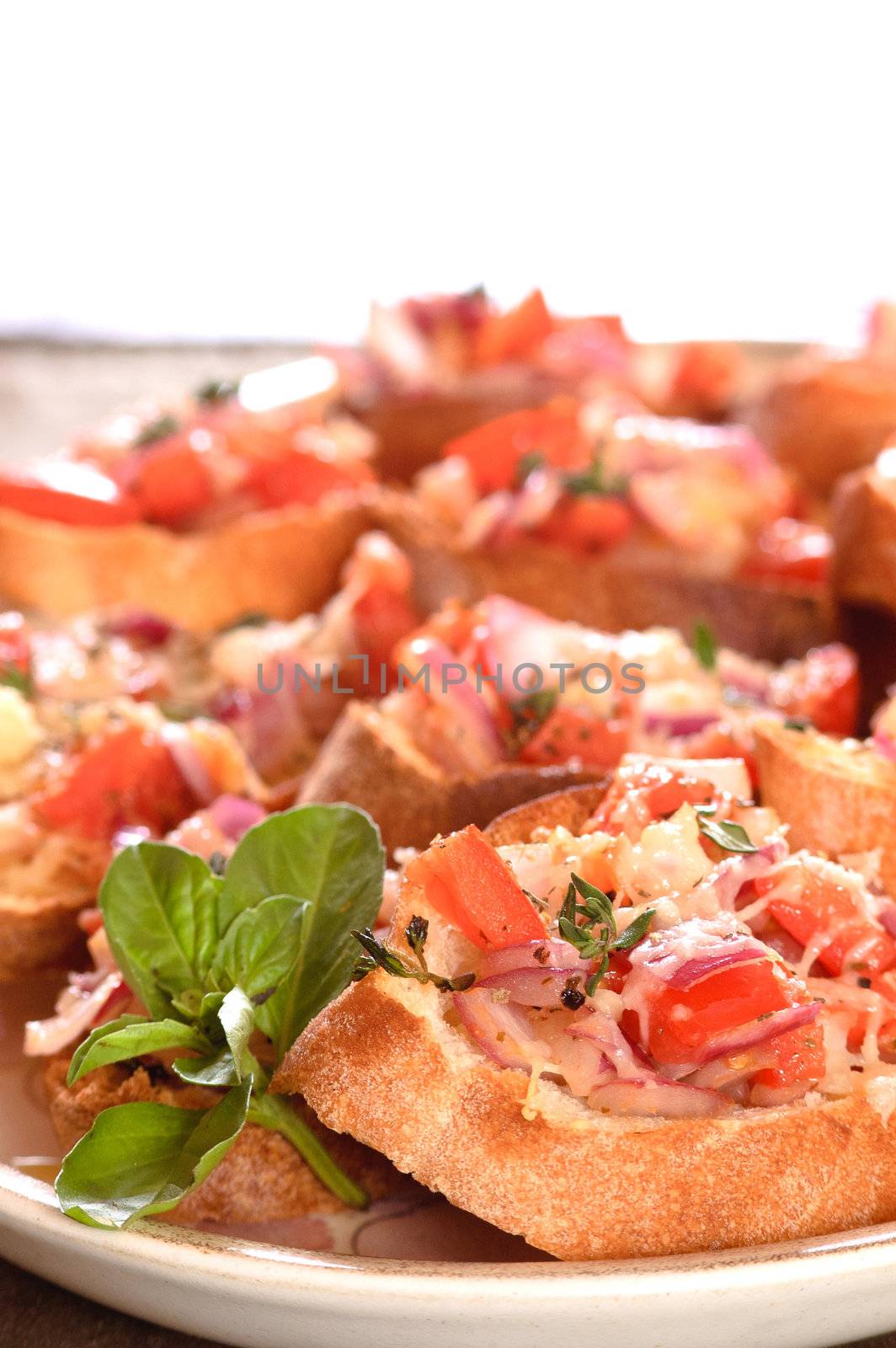 closeup of a plate of Bruschetta with space above for your text