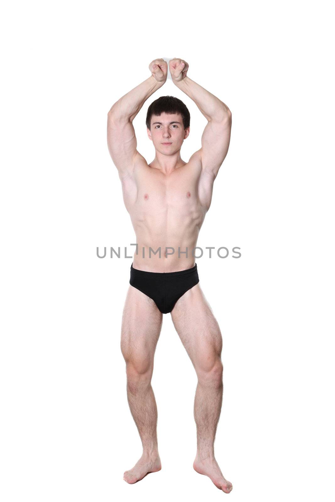 The young body builder poses with greater muscles on a white background