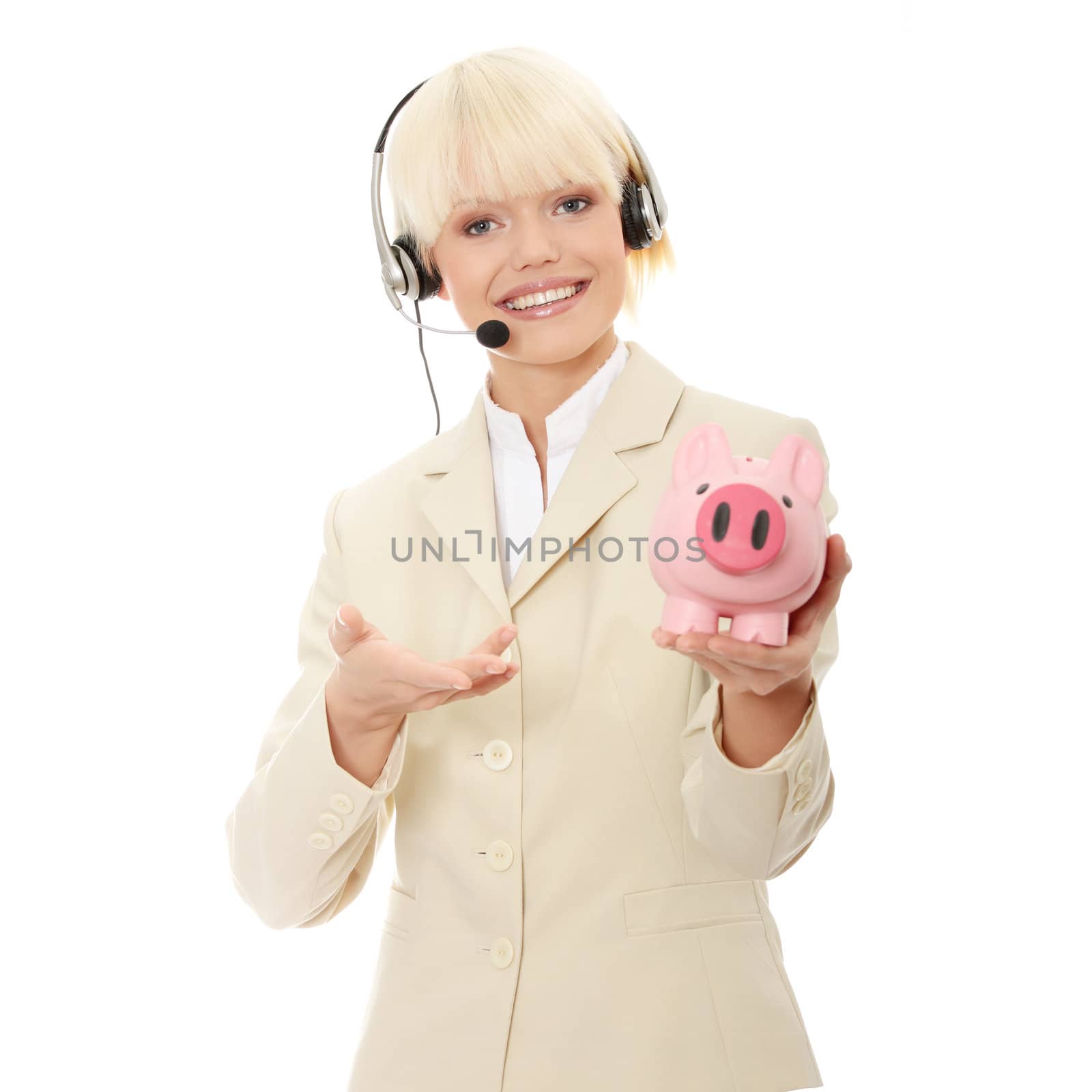 Young business woman with headset holding piggy bank