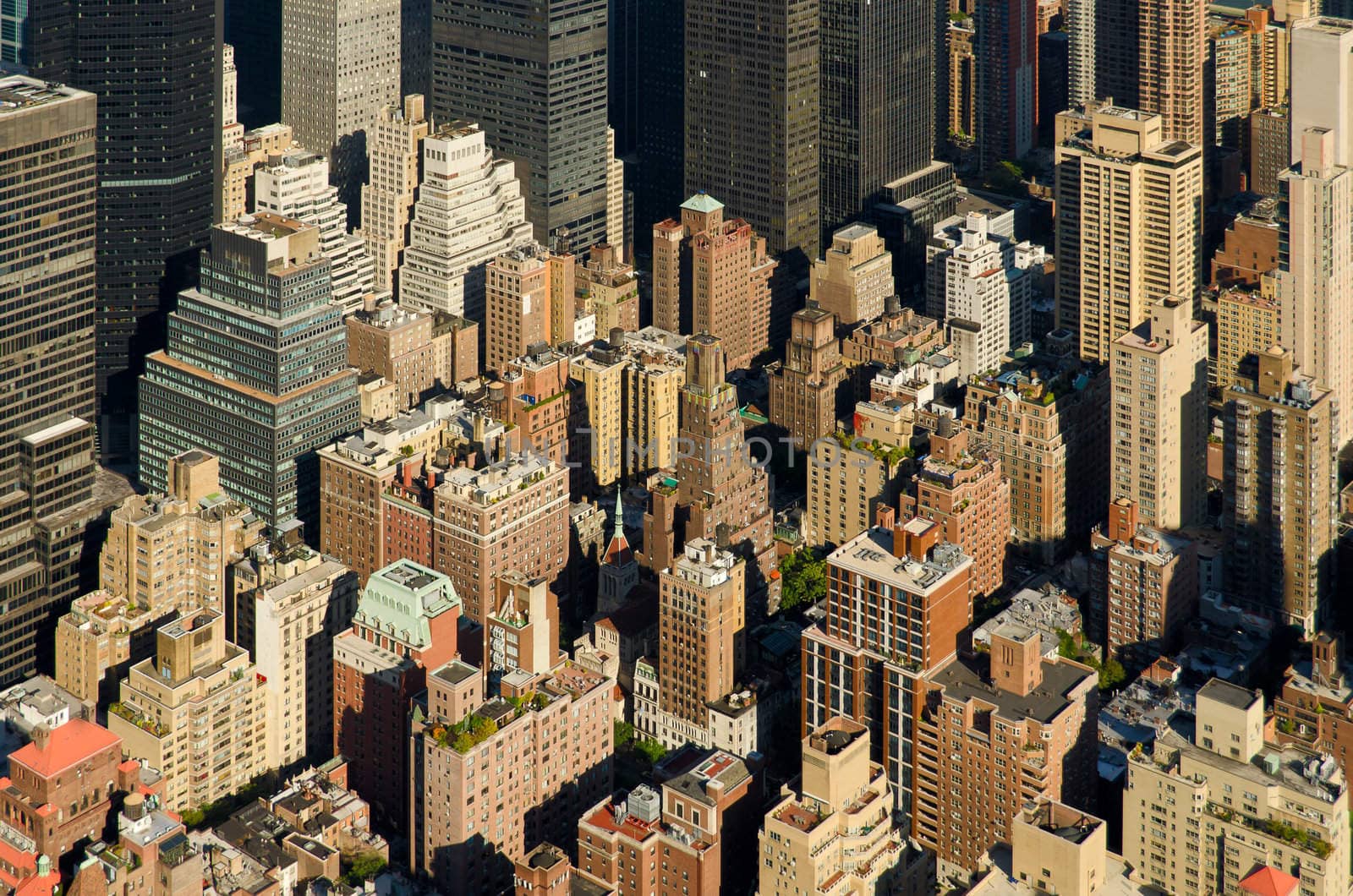 Aerial view of Midtown Manhattan residential and commercial buildings, seen from the top of the Empire State Building, New York City, New York, USA by CharlesBolin