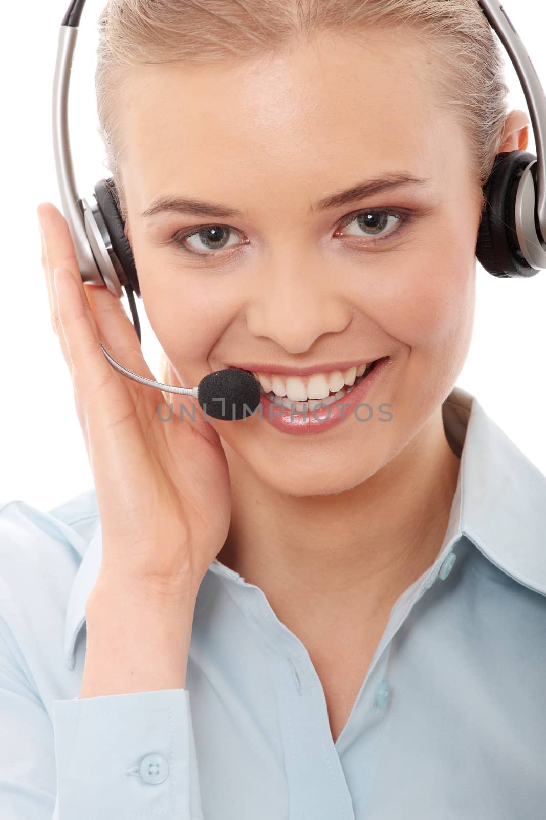 Call center woman with headset. Beautiful smiling caucasian woman isolated on white background.