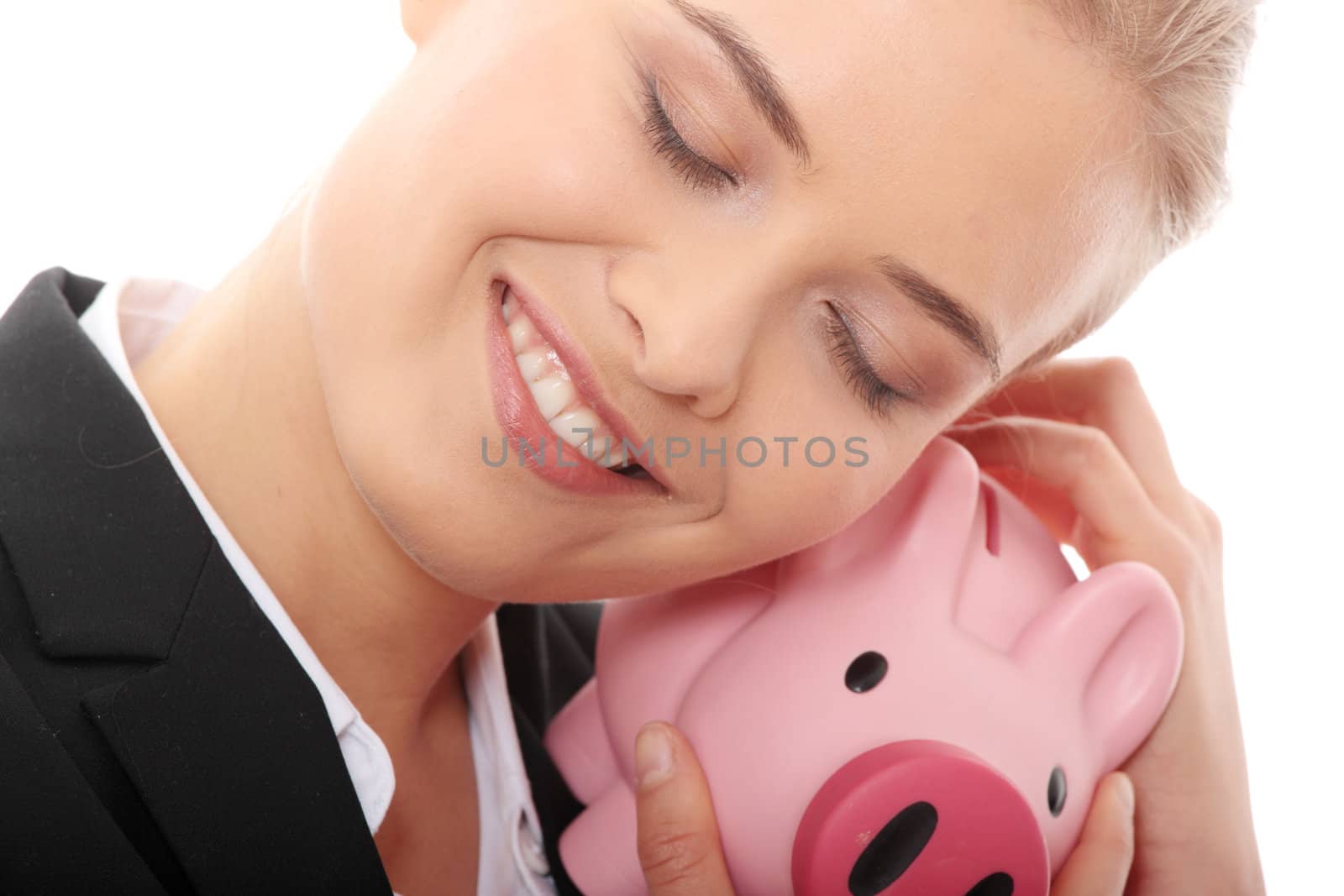 Businesswoman holding piggy bank. Isolated on white background