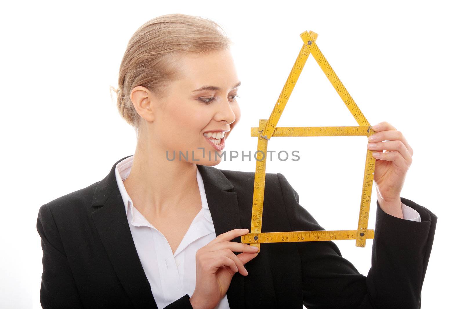 Beautiful businesswoman with house model , isolated on white background