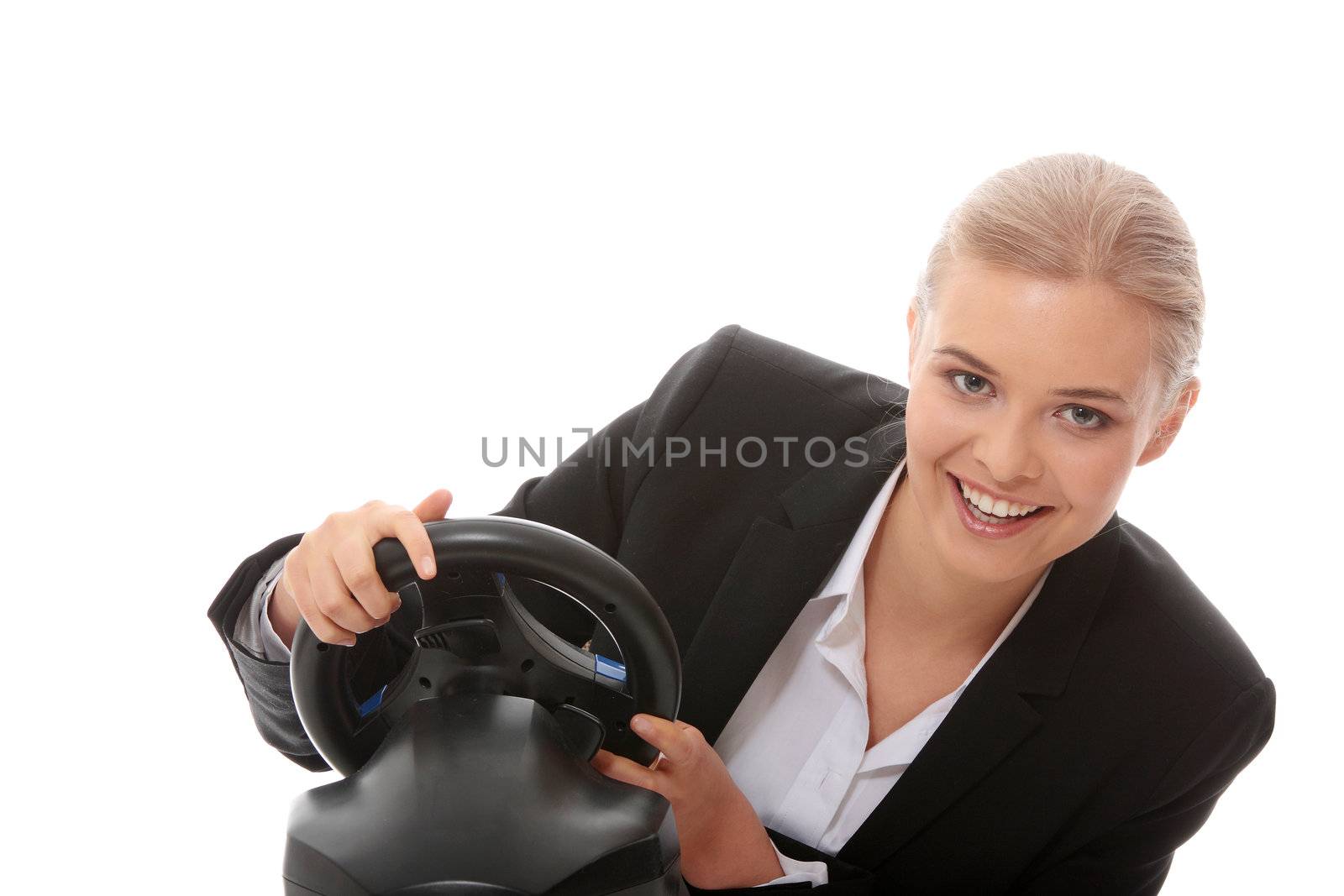 Young caucasian business woman playing on computer (with steering wheel), isolated on white background