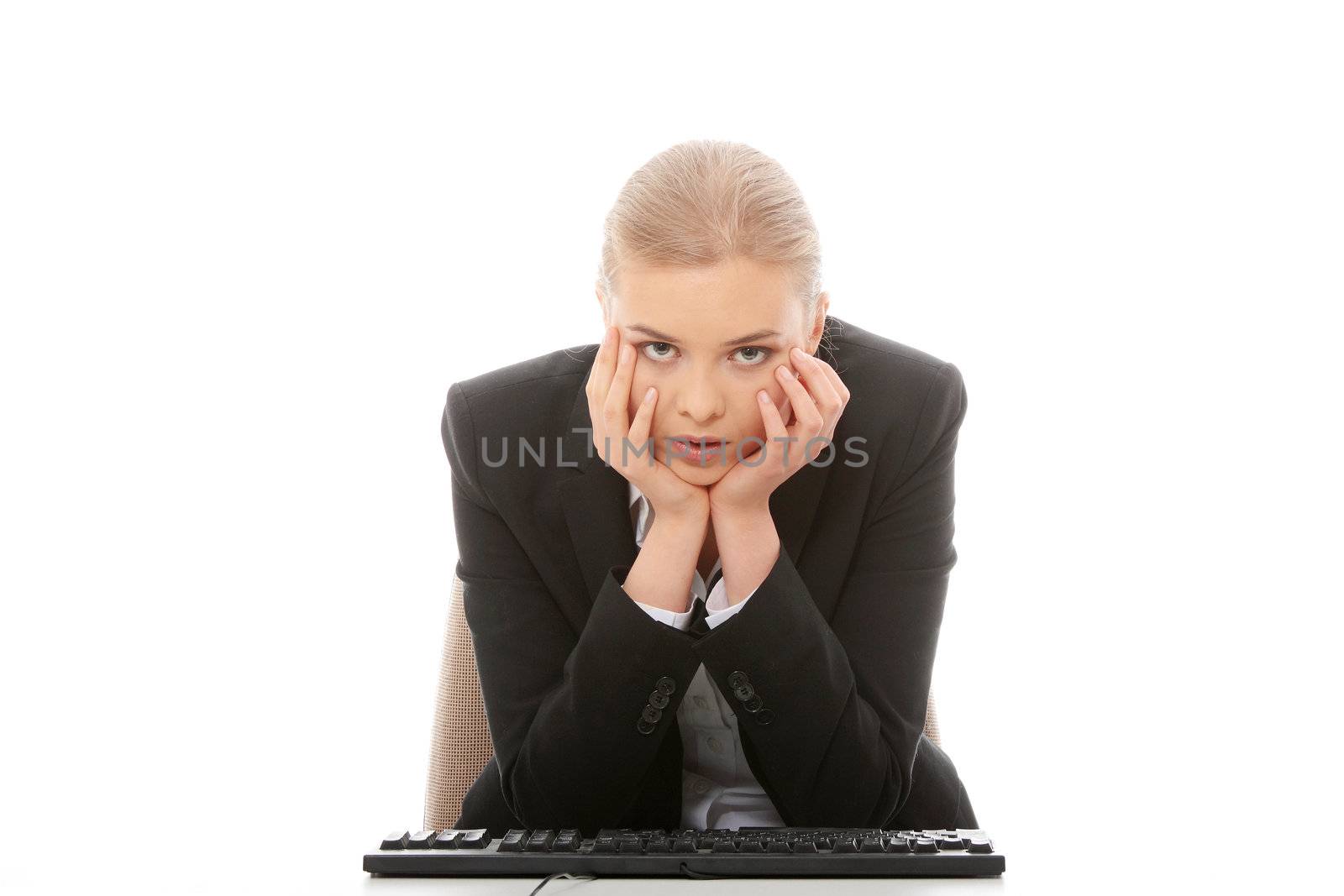 Bored businesswoman working on pc, isolated on white background