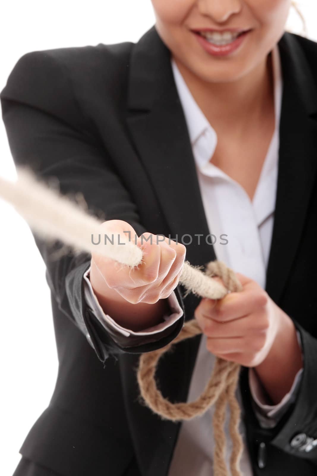 Businesswoman pulling on a piece of rope. Isolated on white
