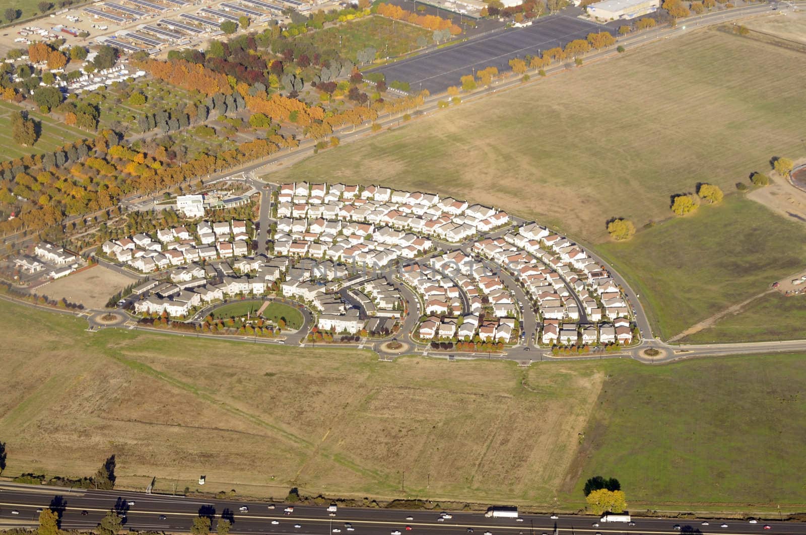 Modern Housing development with unfinished lots from the air