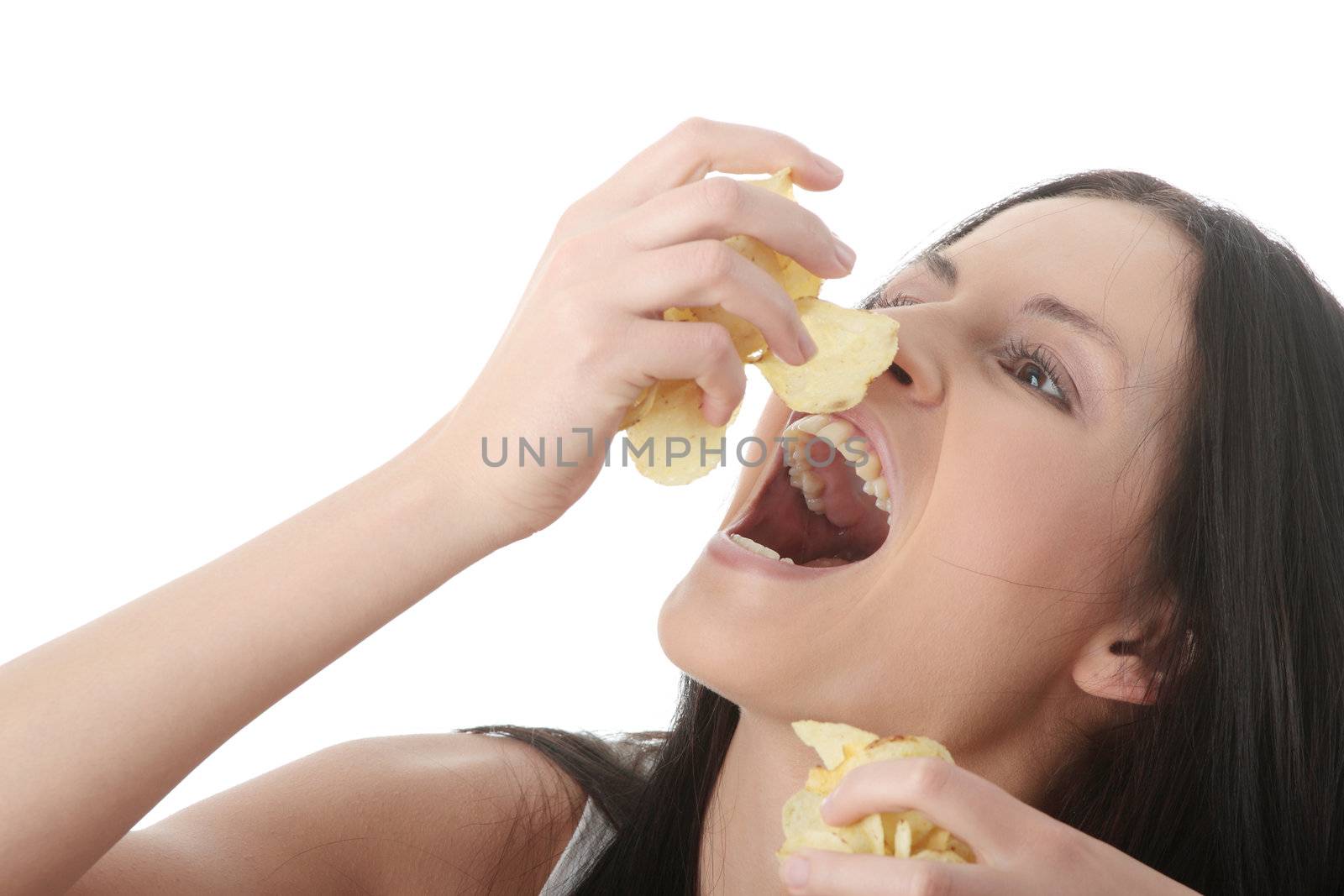 Young beautiful woman eating chips, isolated on white