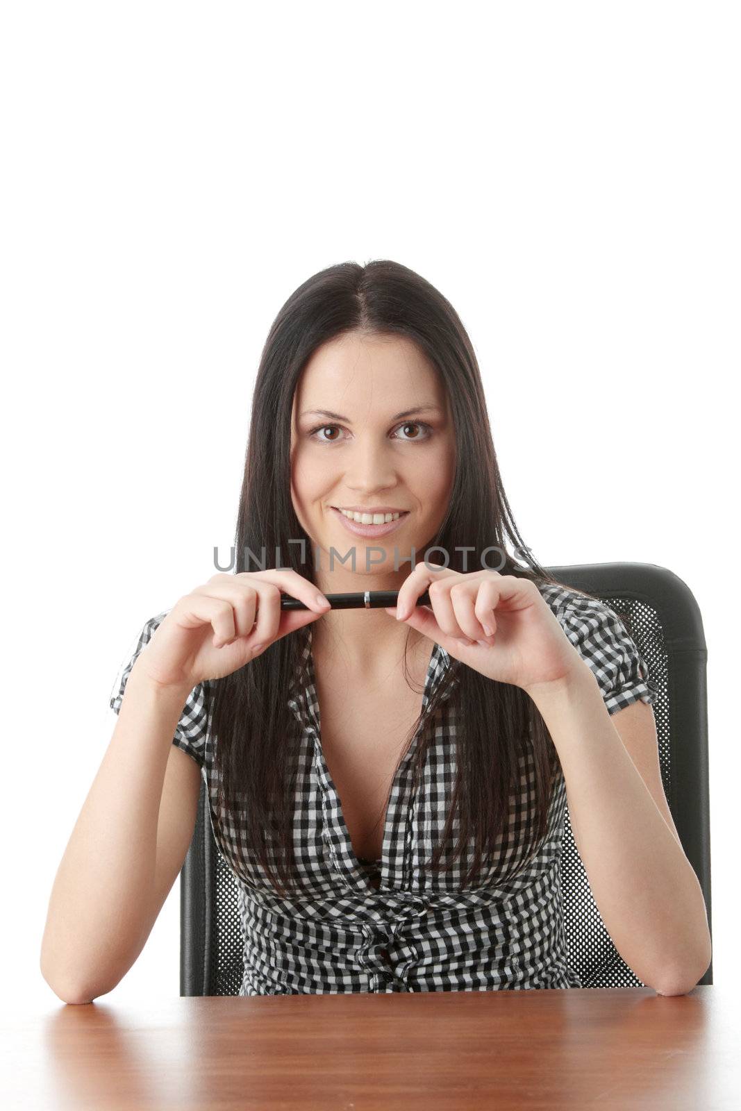 Business woman behind a desk, isolated on white