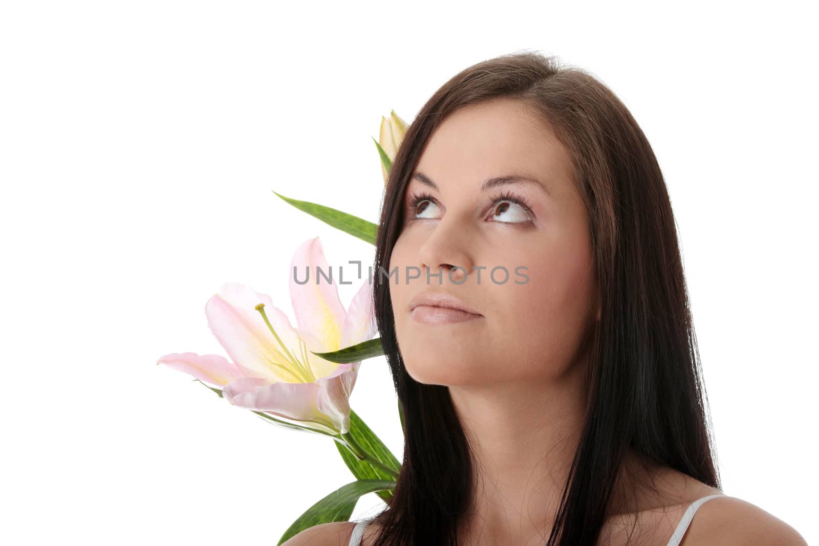 Beautiful young woman with lily flower by BDS
