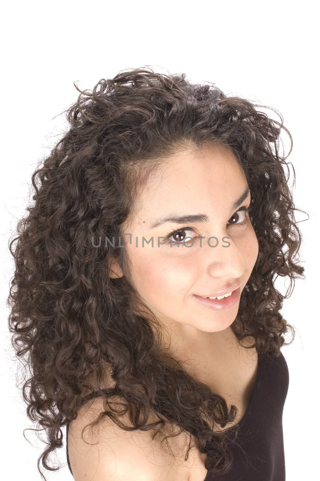 Beautiful young Hispanic woman smiling up at the viewer