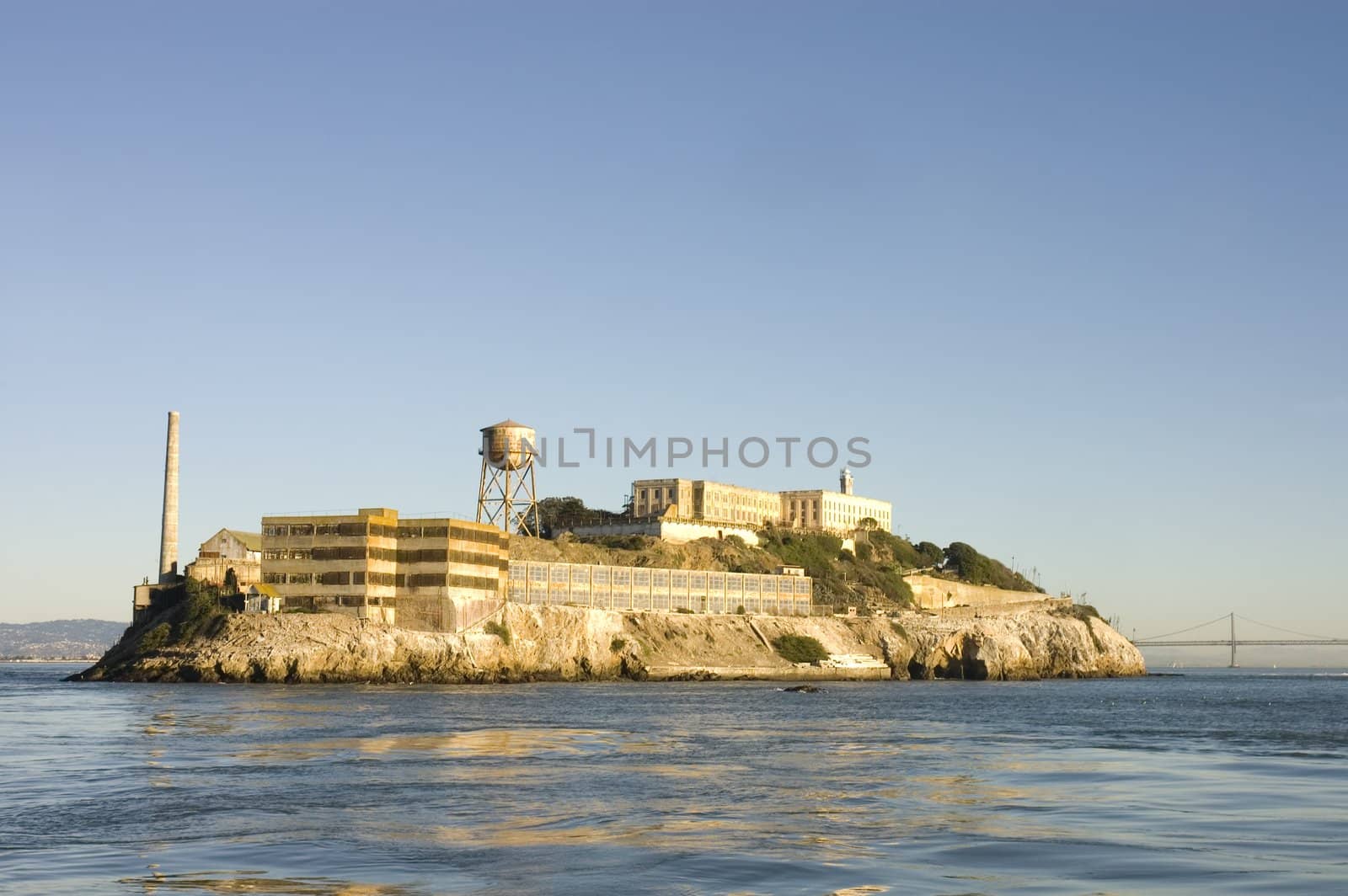 Alcatraz island in San Francisco Bay at sunset