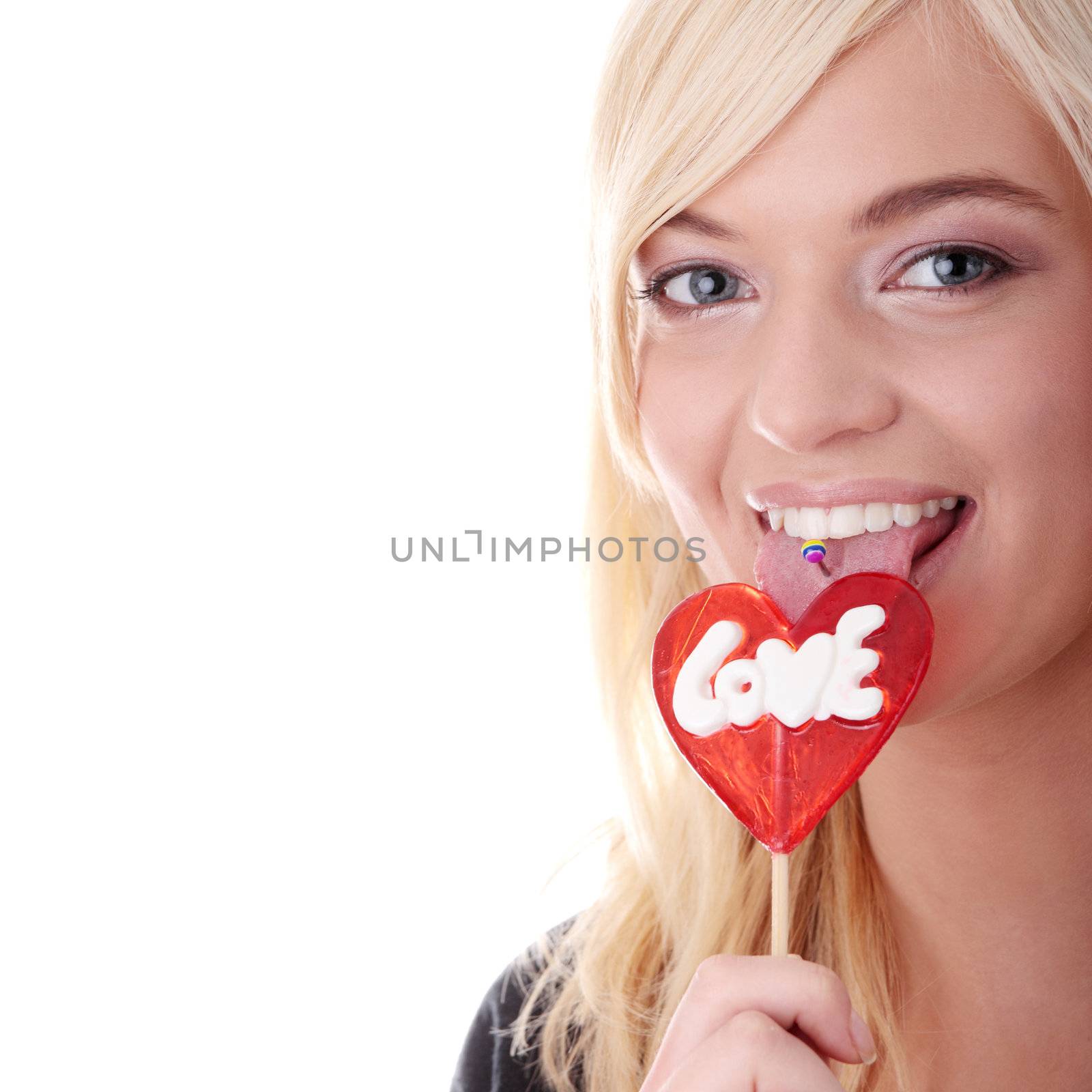 Teenage girl holding red lollipop by BDS