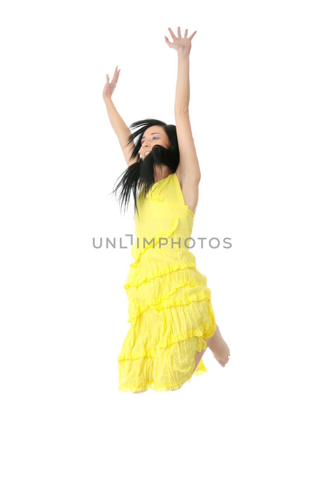 Young happy woman jumping. Isolated on white background