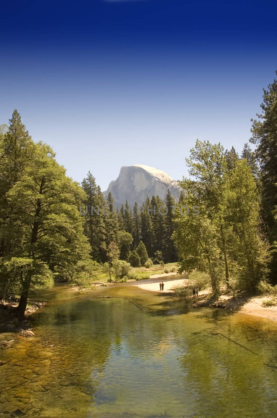 Half dome from Yosemite Valley with the merced river
