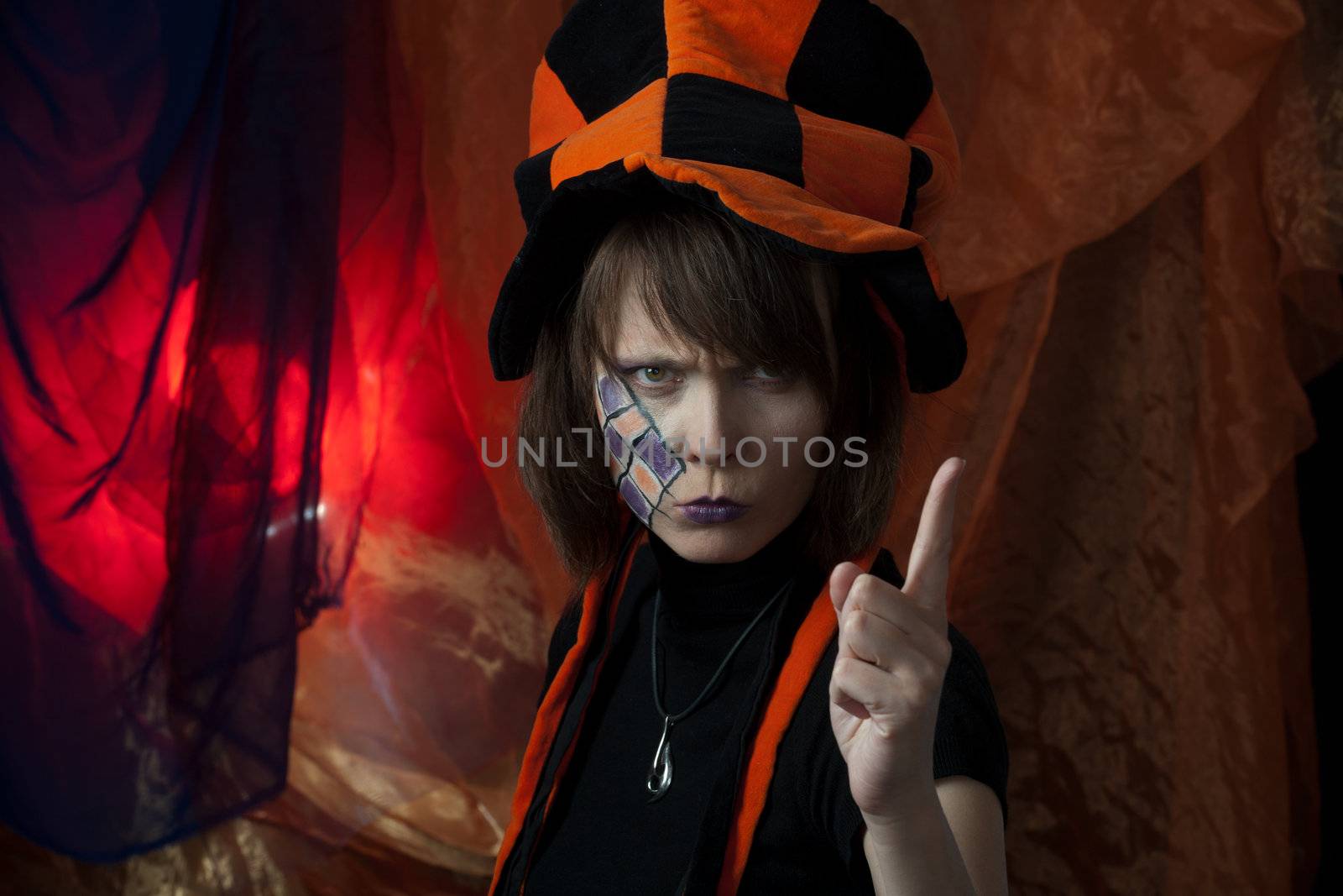 clown or angry mad hatter - creative studio shot