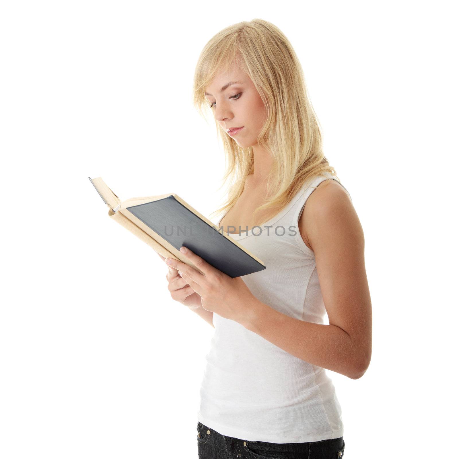 Teen woman reading book by BDS