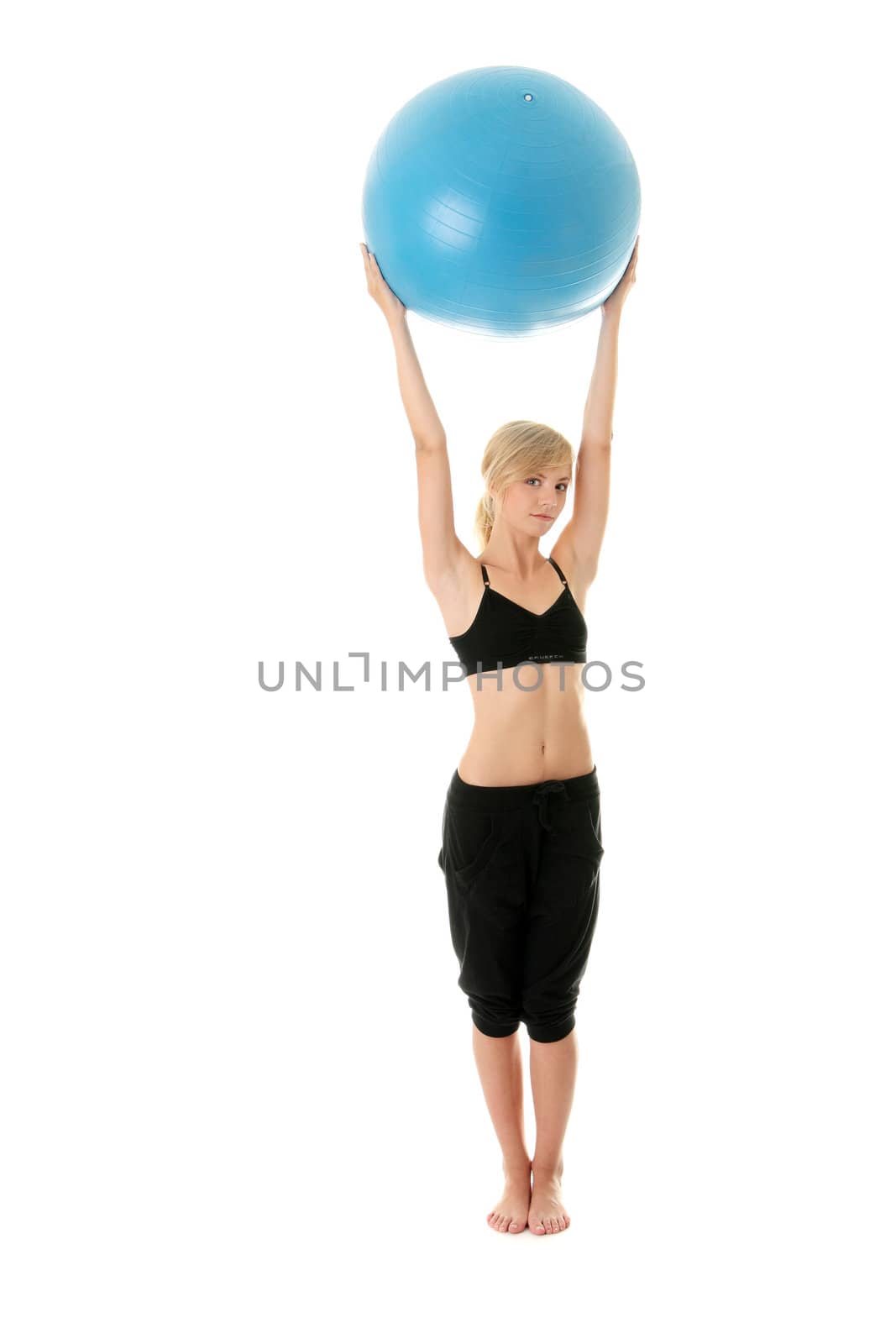Young woman doing exercise, isolated on white