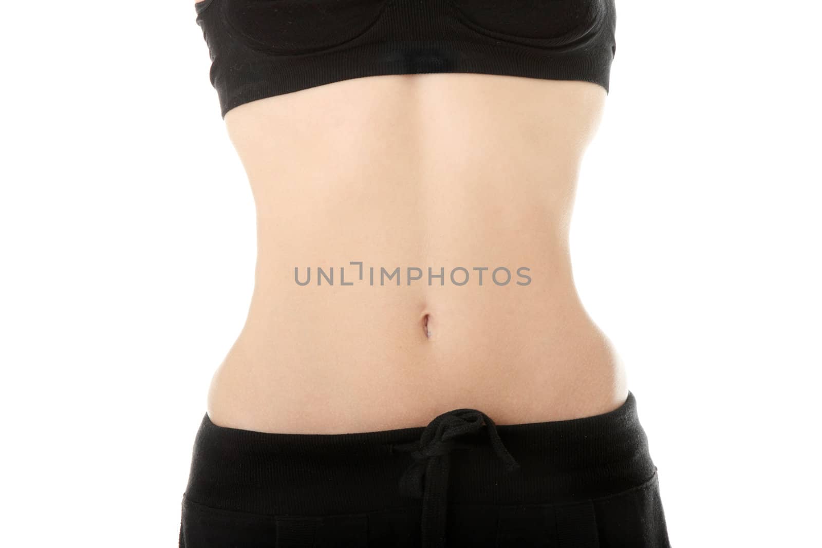 Slim woman belly, isolated on white background