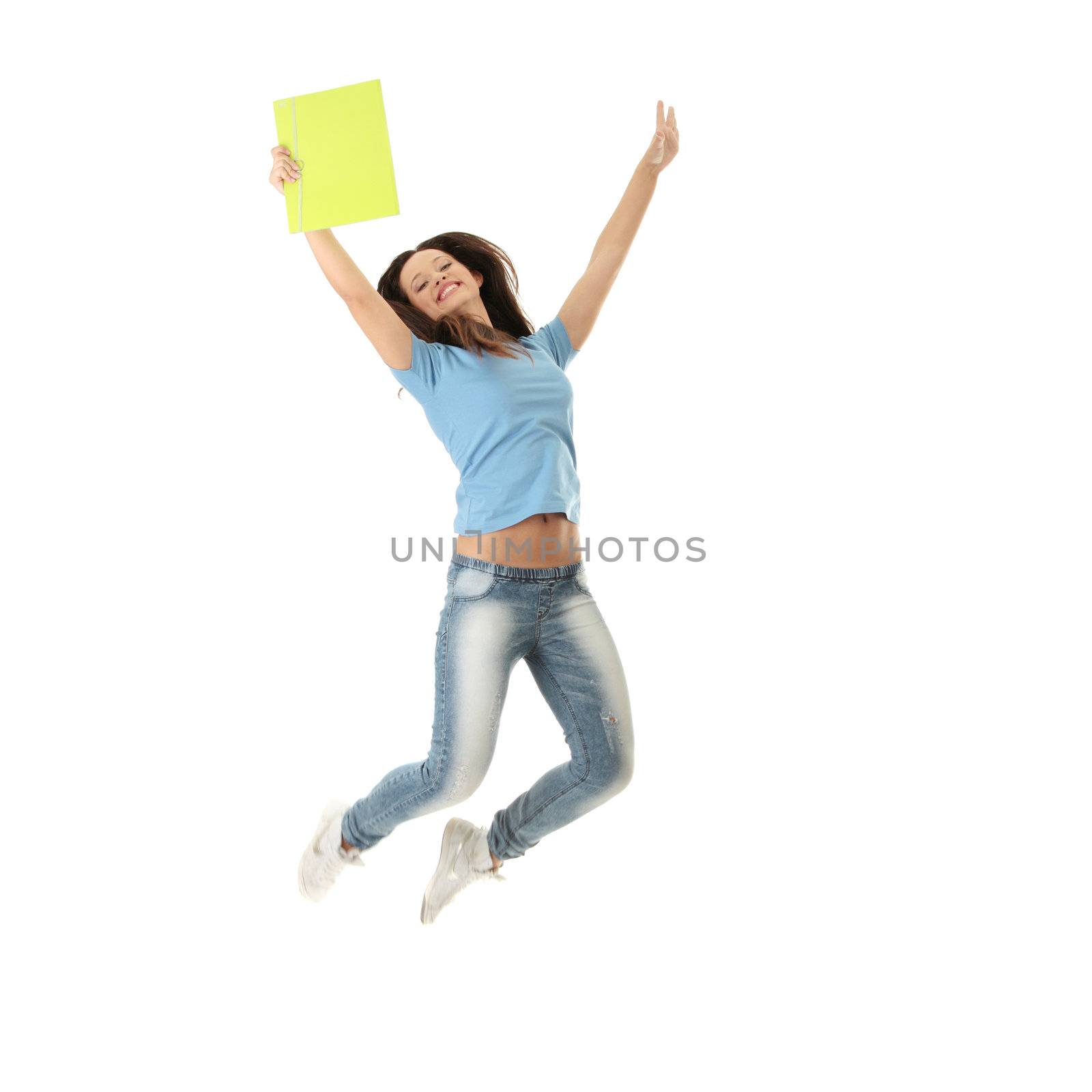 Jumping female college / university student isolated on white background.