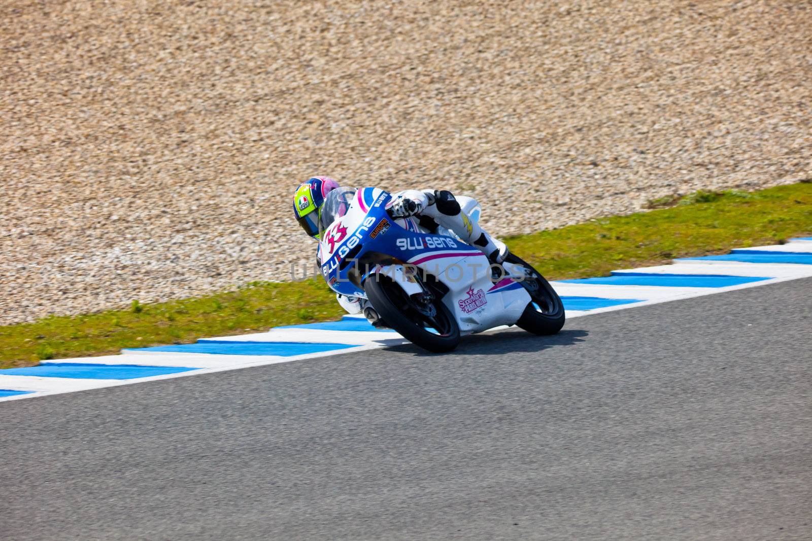 JEREZ DE LA FRONTERA, SPAIN - MAR 5:125cc pilot Sergio Gadea races on the official training of the world championship of MotoGP on Mar 5, 2011, in racetrack of velocity of Jerez de la Frontera, Spain