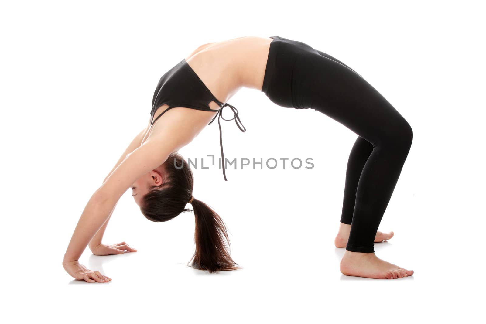 Young woman doing exercise isolated on white