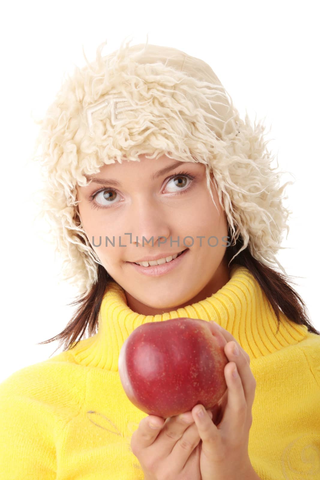 Teen woman with red apple isolated on white background