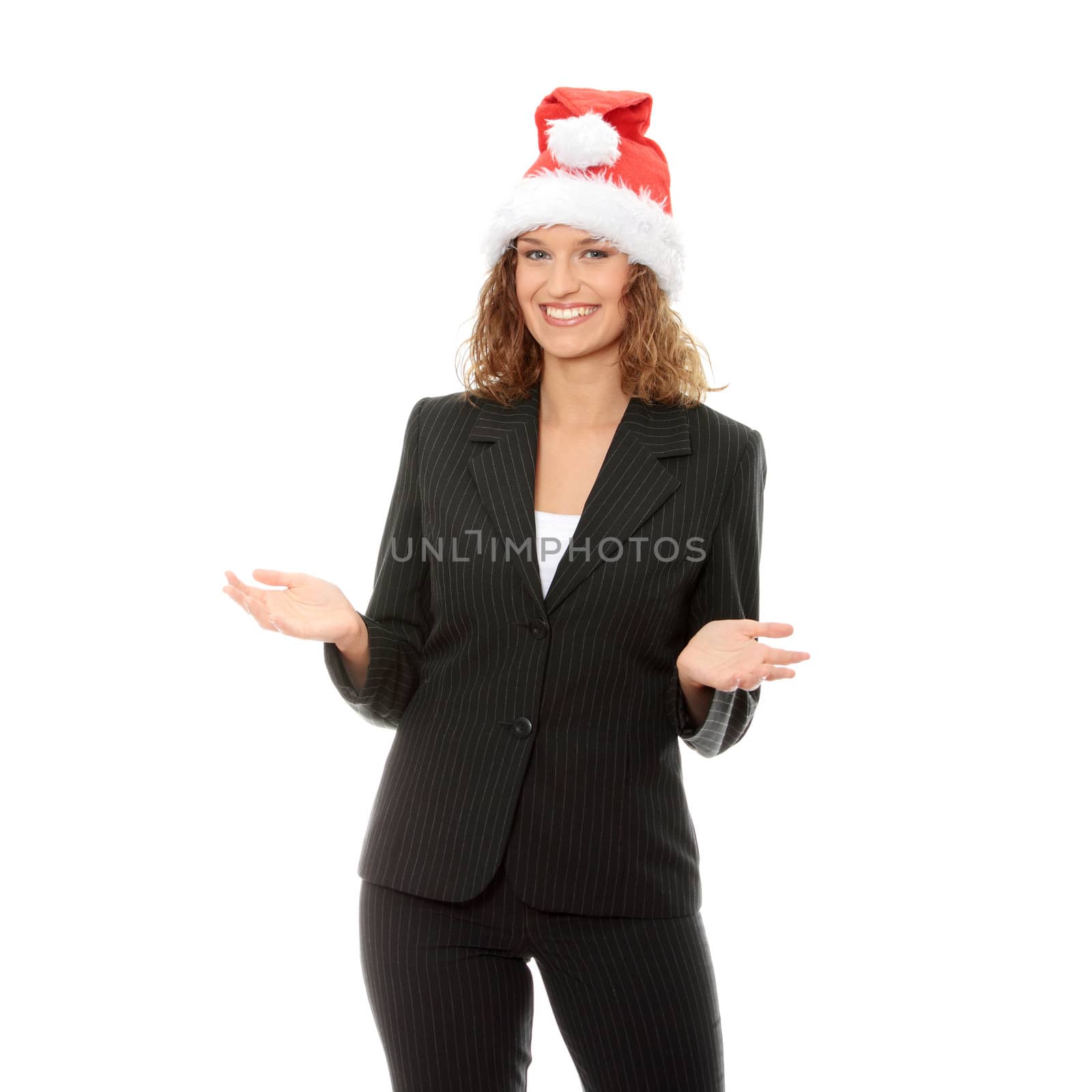 Beautiful business girl wearing santa's cap